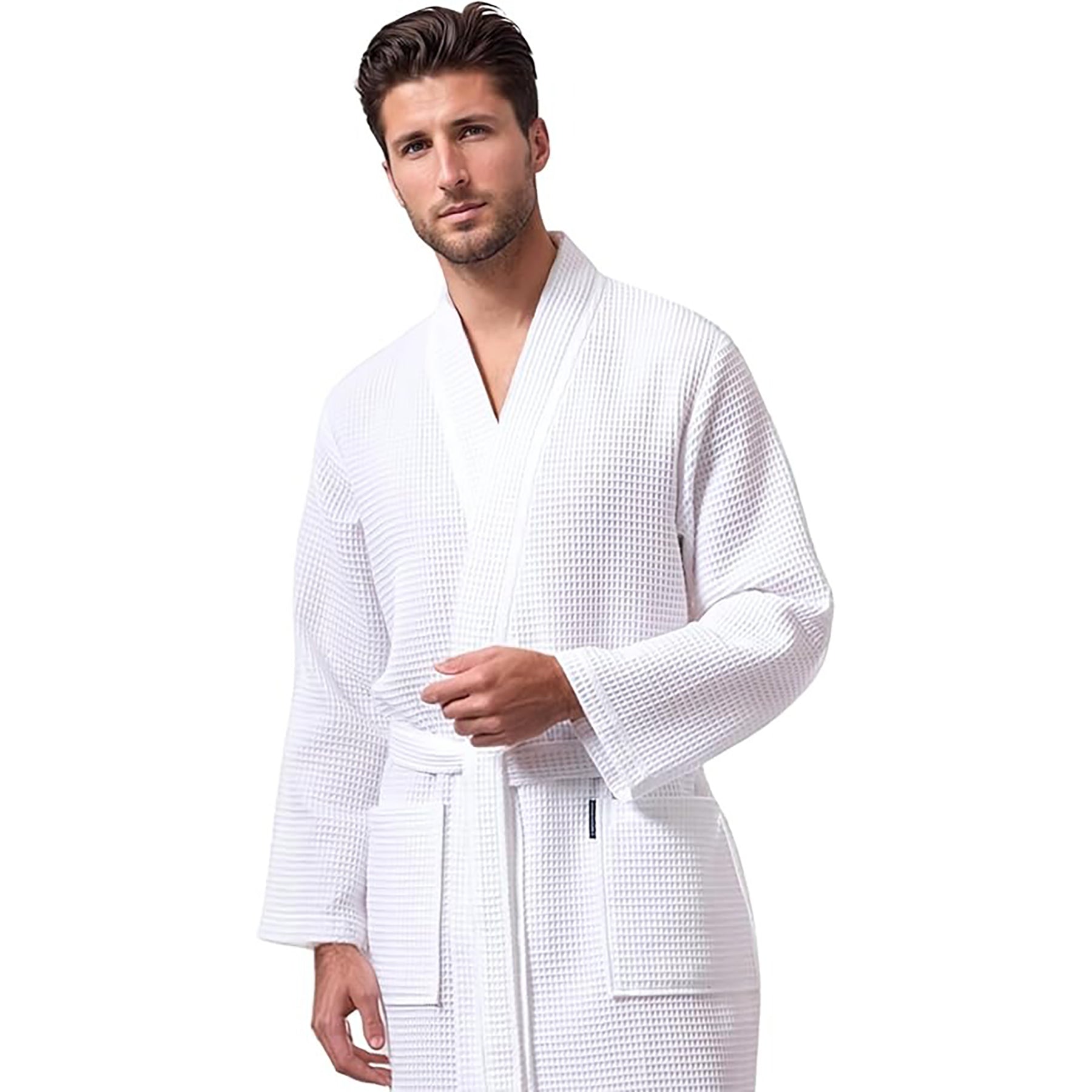 Close-up of man in white cotton waffle robe – lightweight and absorbent with front pockets.