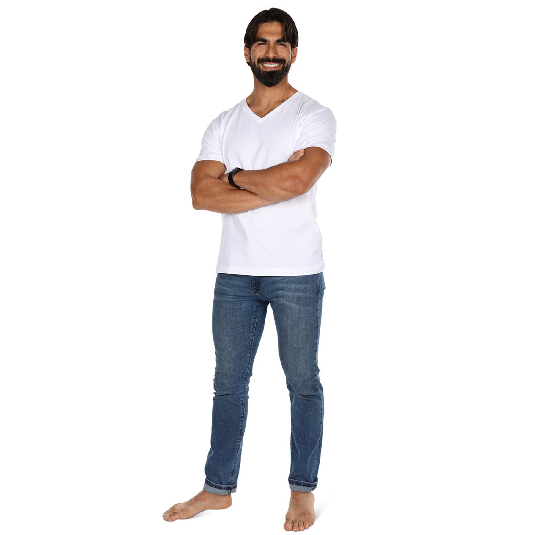 Man wearing MeMoi Men’s white cotton V-neck T-shirt and jeans, full-body view