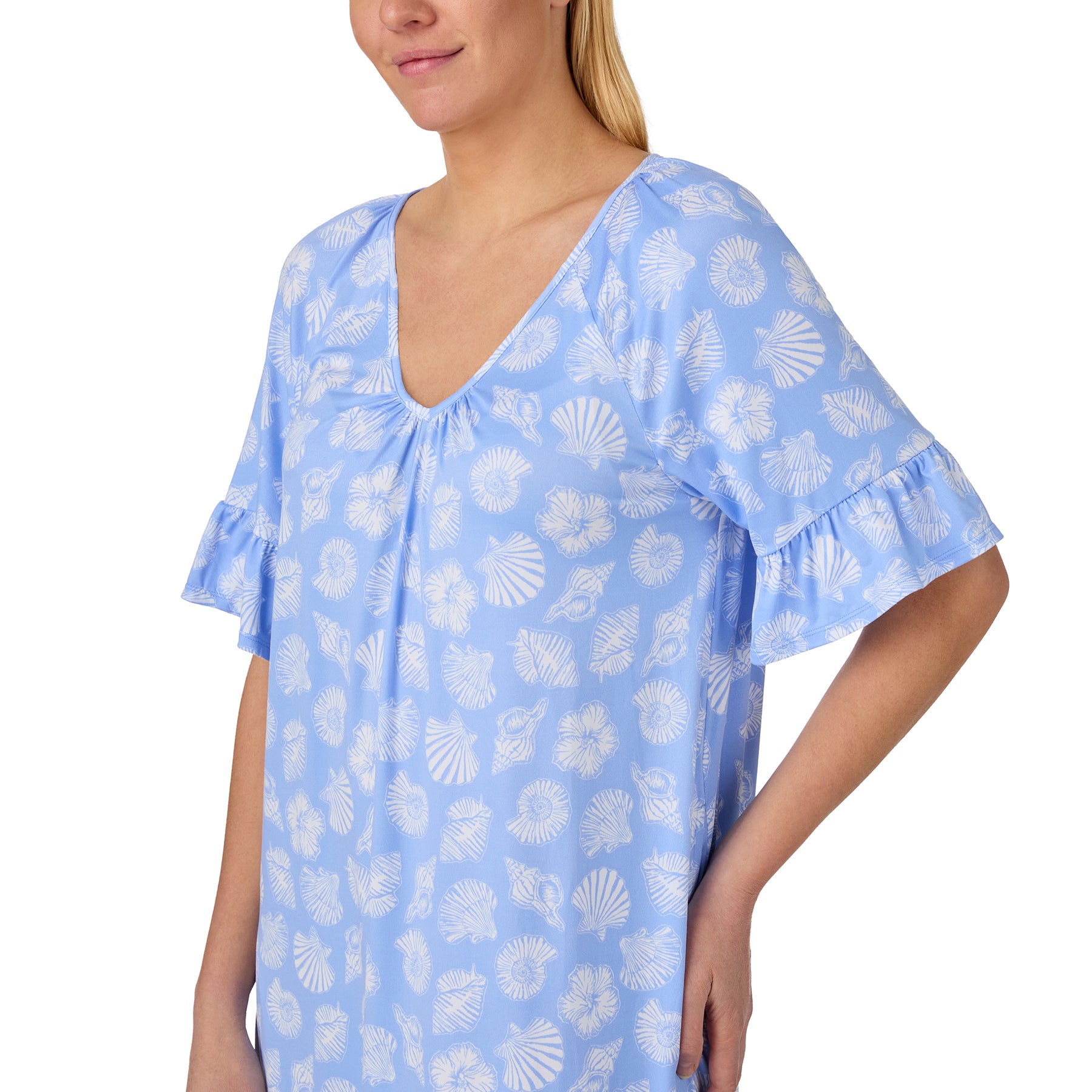 Close-up of the Ellen Tracy seashell print sleep shirt showcasing the light blue fabric, white coastal shell pattern, flutter sleeve detail, and gathered V-neckline.