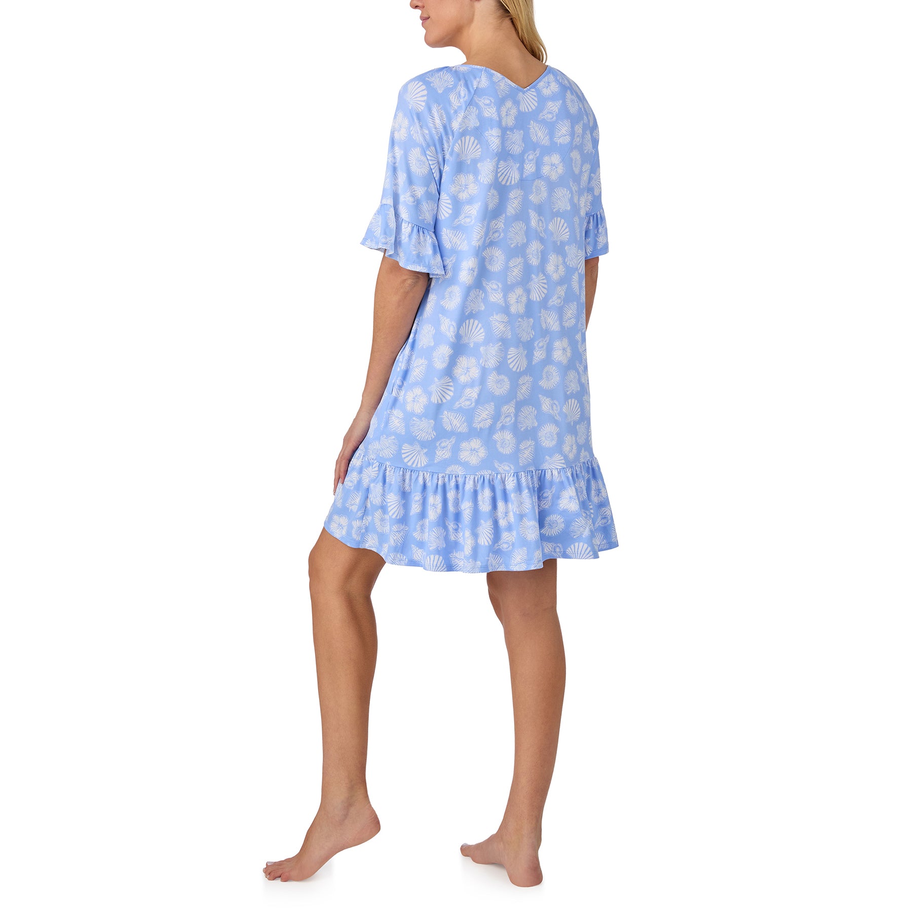 Back view of the Ellen Tracy light blue sleep shirt with an all-over white seashell print, flutter sleeves, and a loose, comfortable fit finished with a ruffled hem.