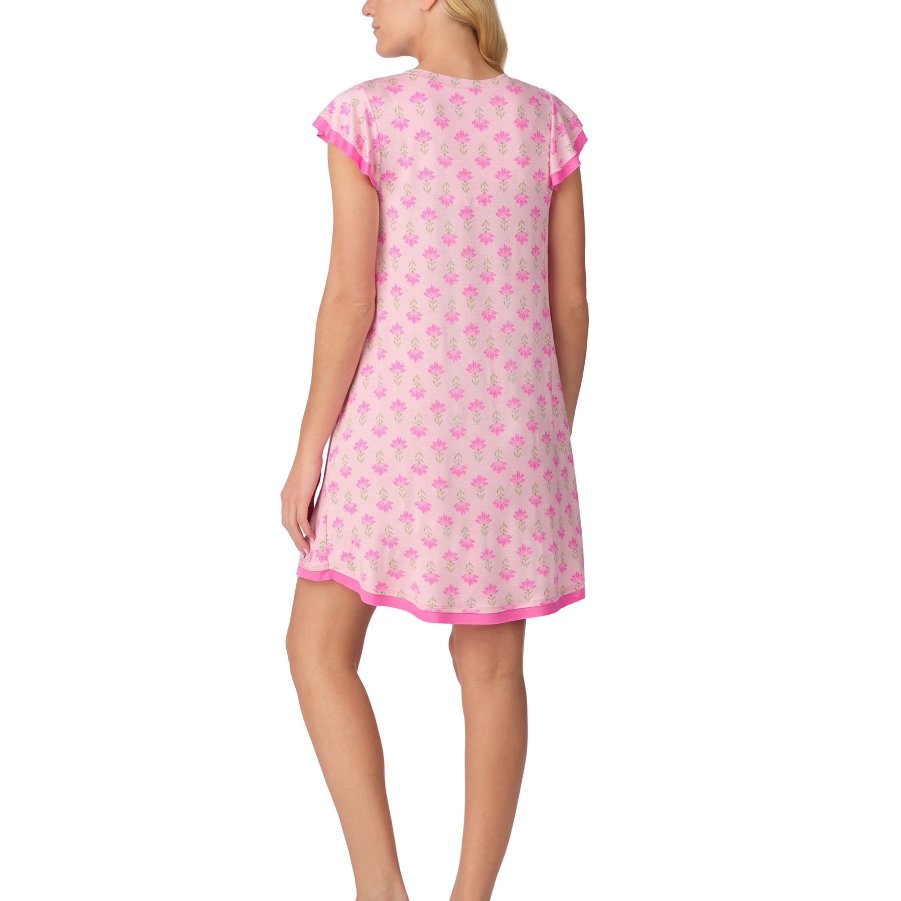 Back view of a women’s pink floral nightdress with flutter sleeves and a softly flowing shape.