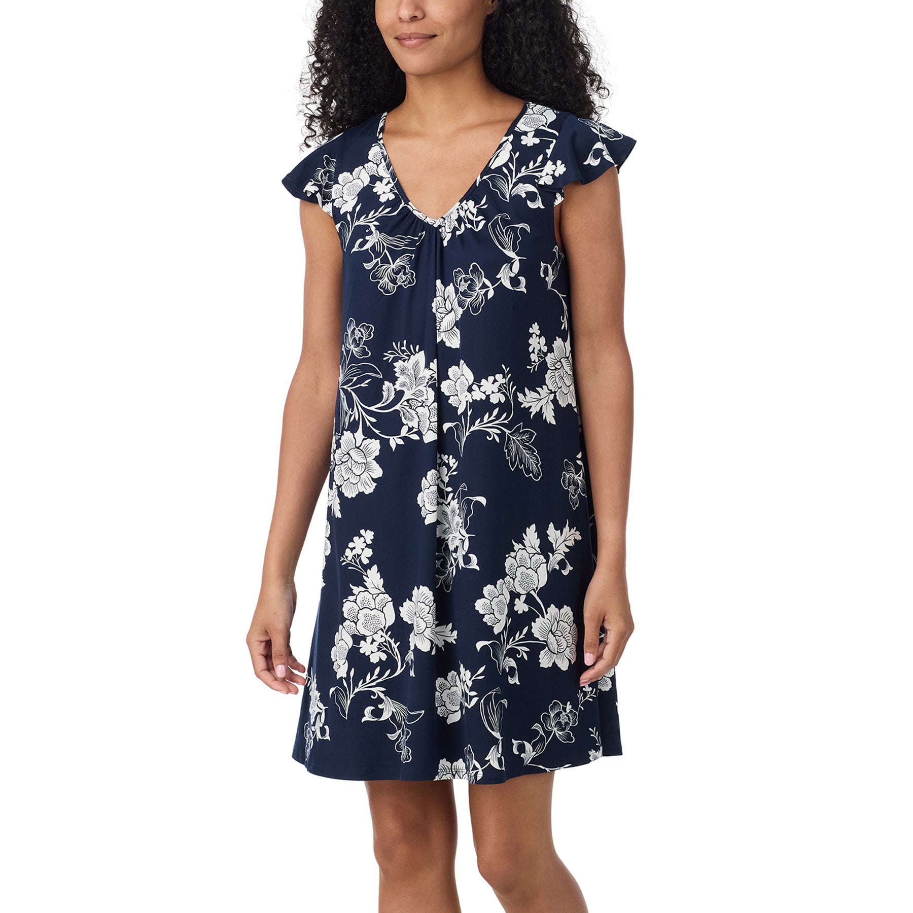 Three-quarter front view of navy floral nightgown featuring a white botanical print, softly gathered V-neckline and above-the-knee length.