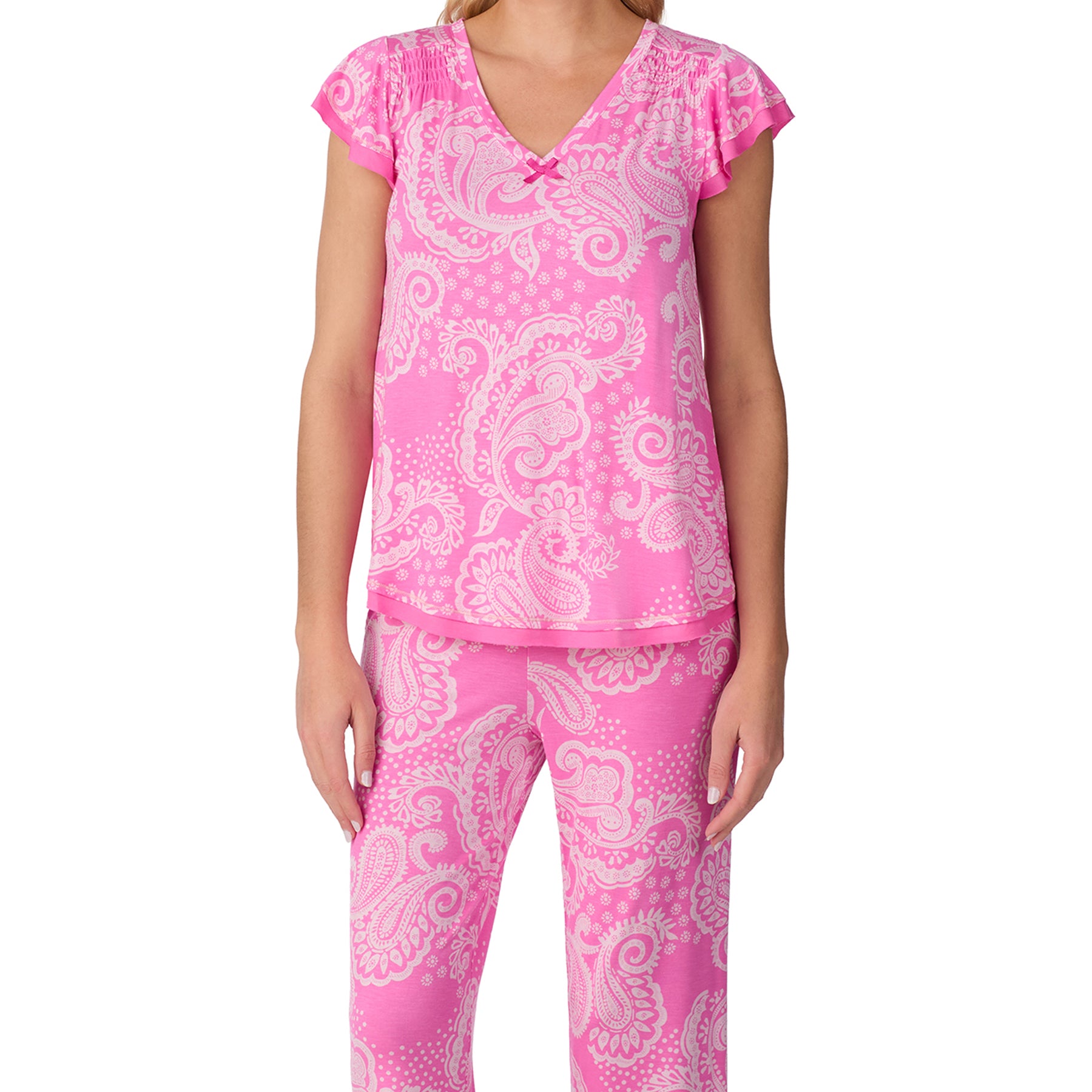 Full-length front view of the pink paisley pyjama set featuring a V-neck top and relaxed capri bottoms.