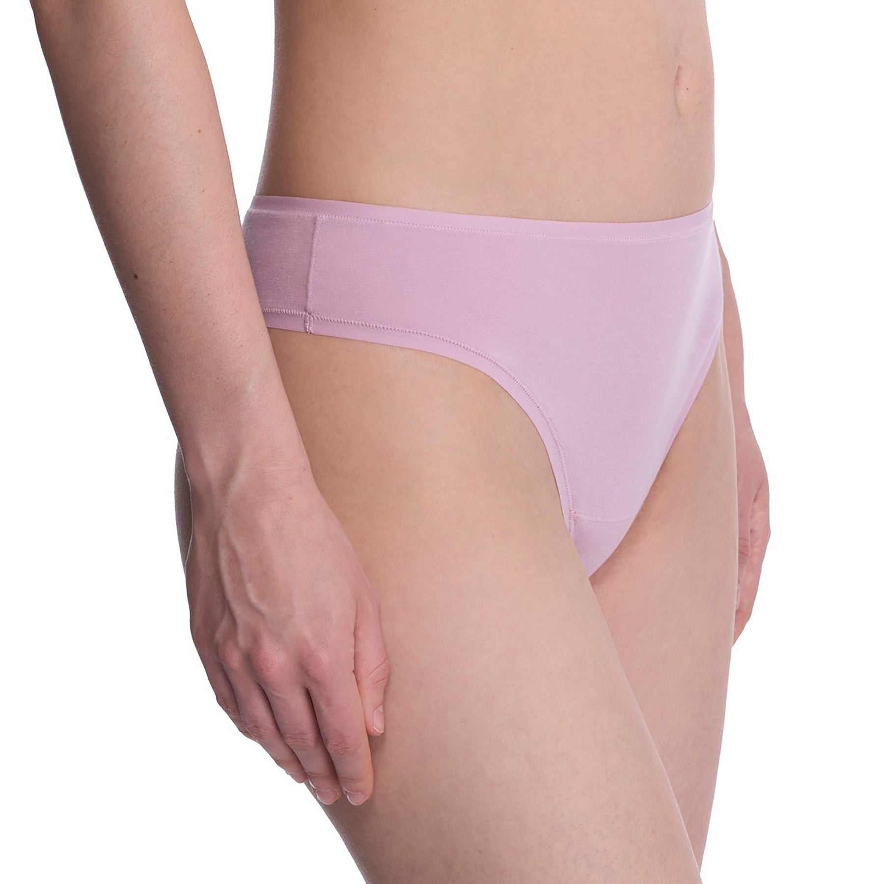 Seamless pima cotton mid-rise thong in rose mist dusty rose purple. Side view close up on model.