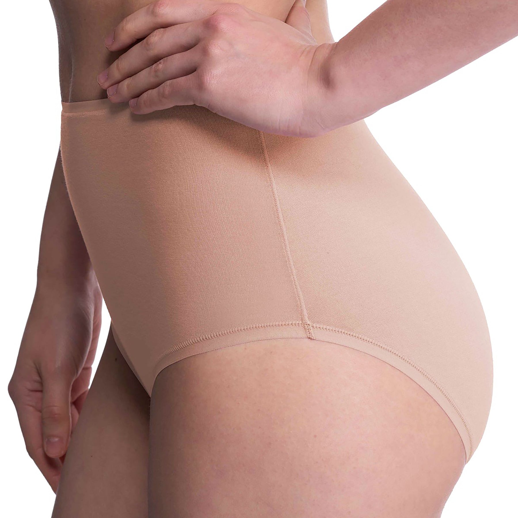 Seamless pima cotton high-rise full brief in cafe nude. Side view close up on model.