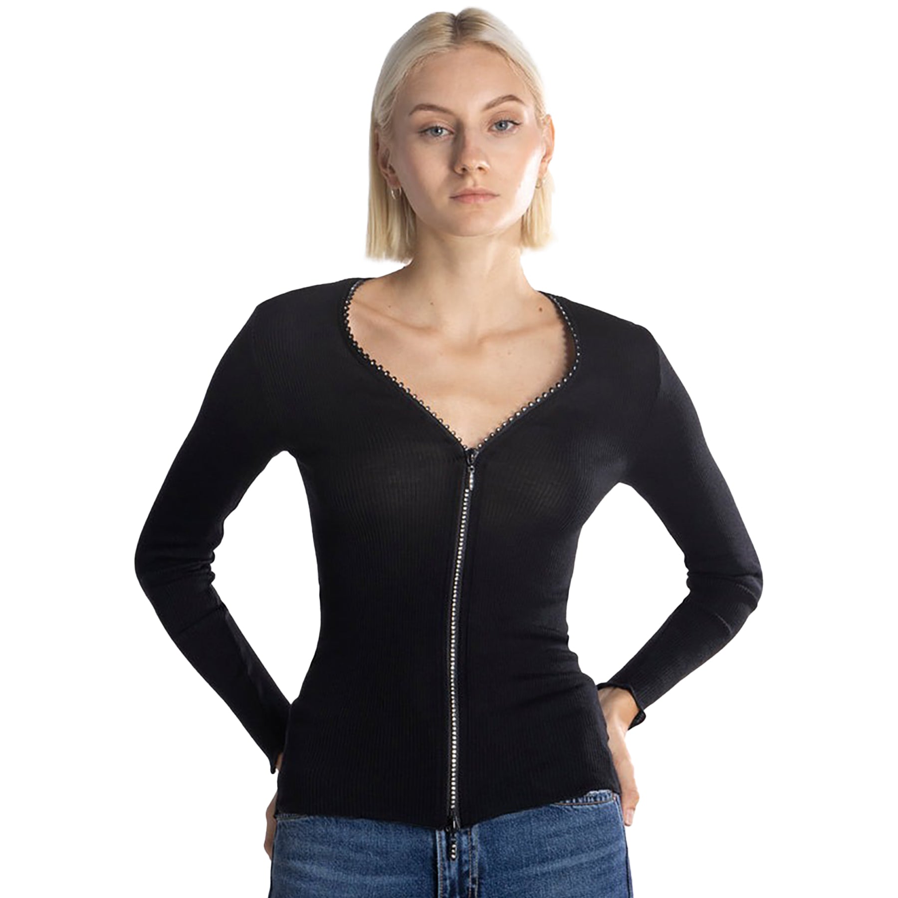 Long sleeve wool and silk blend ribbed top with zipper and rhinestone neck detail in black. On model front view.