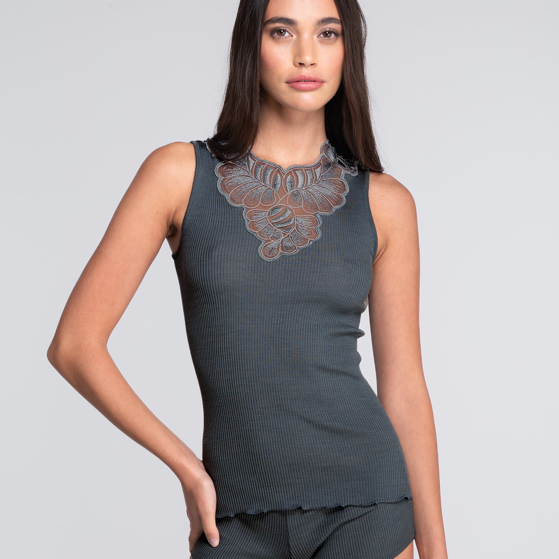 Oscalito 7619 Ribbed Tank with Embroidered Tulle V-Neck in Tempesta – sophisticated blue-grey tank with sheer floral embroidery and ribbed texture.