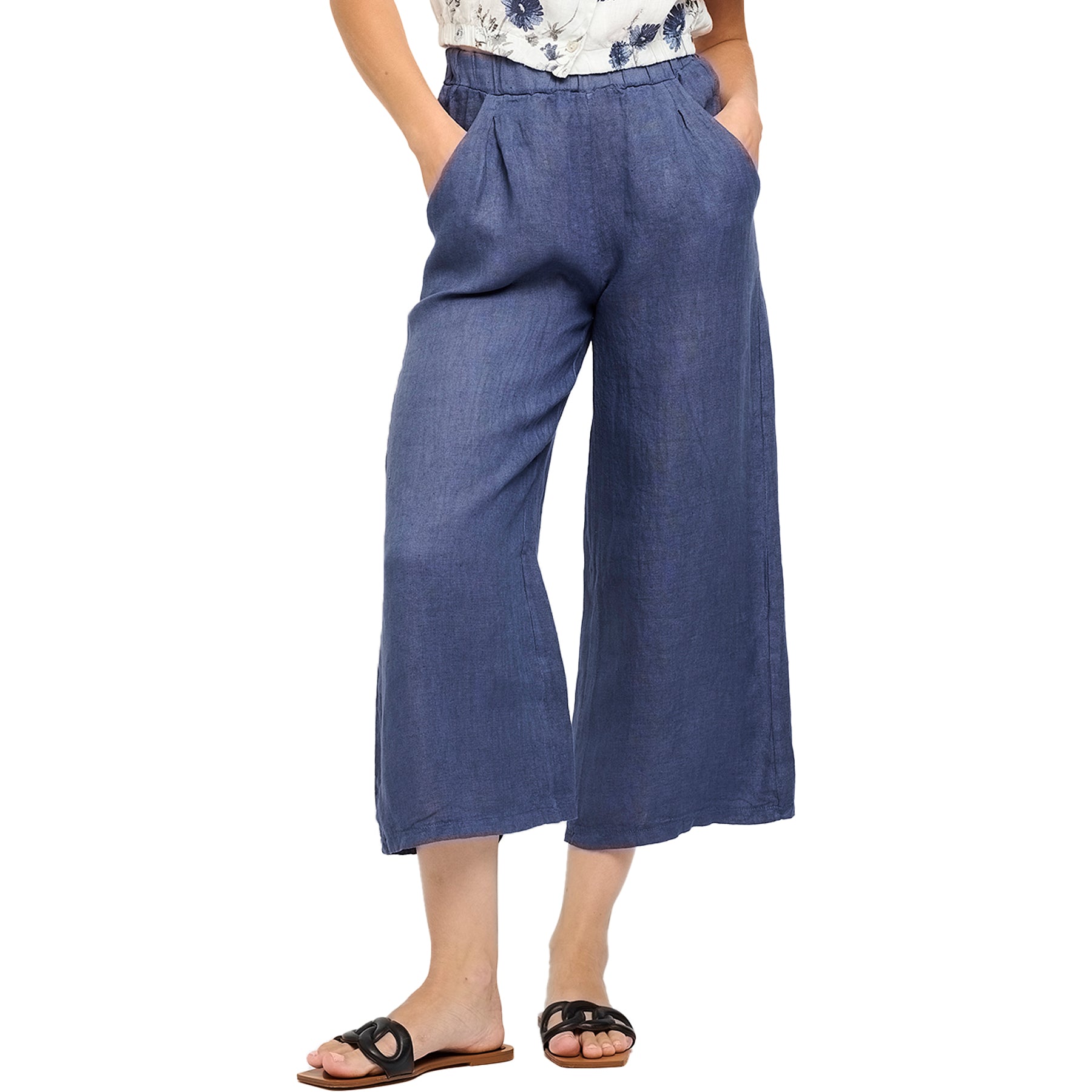 Close-up of deep sea blue cropped linen pants featuring relaxed wide-leg fit and side pockets - casual breathable fashion.