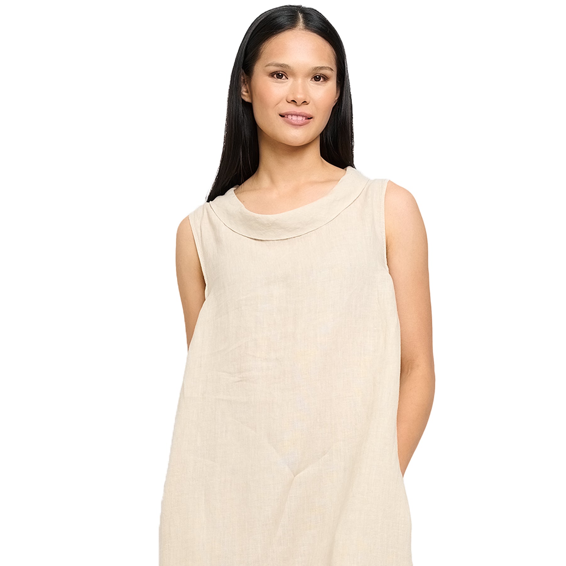 Woman wearing a sleeveless beige dress with soft cowl neckline and natural linen texture - minimal summer fashion.