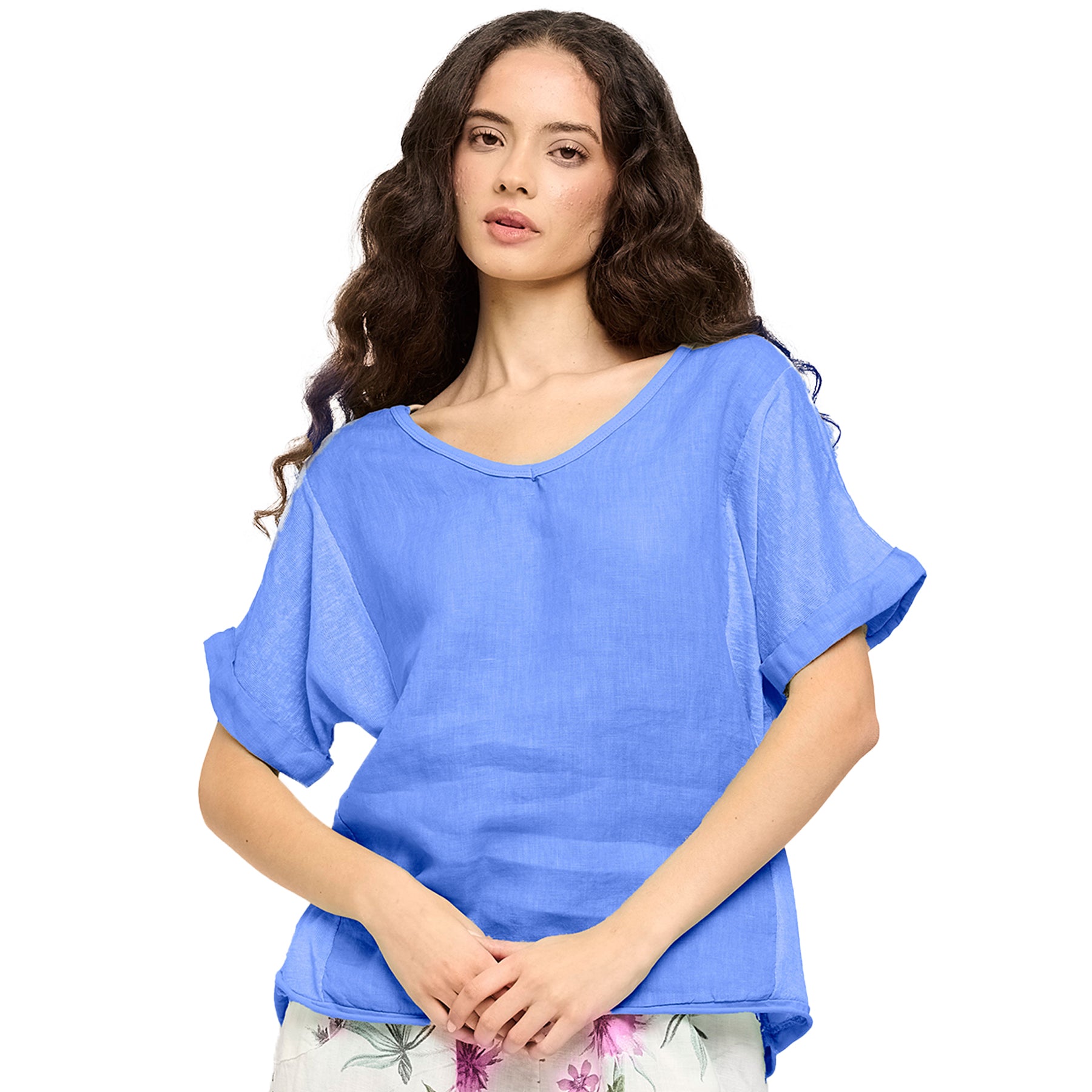 Short sleeve linen and woven top in mykonos blue, front view on model.