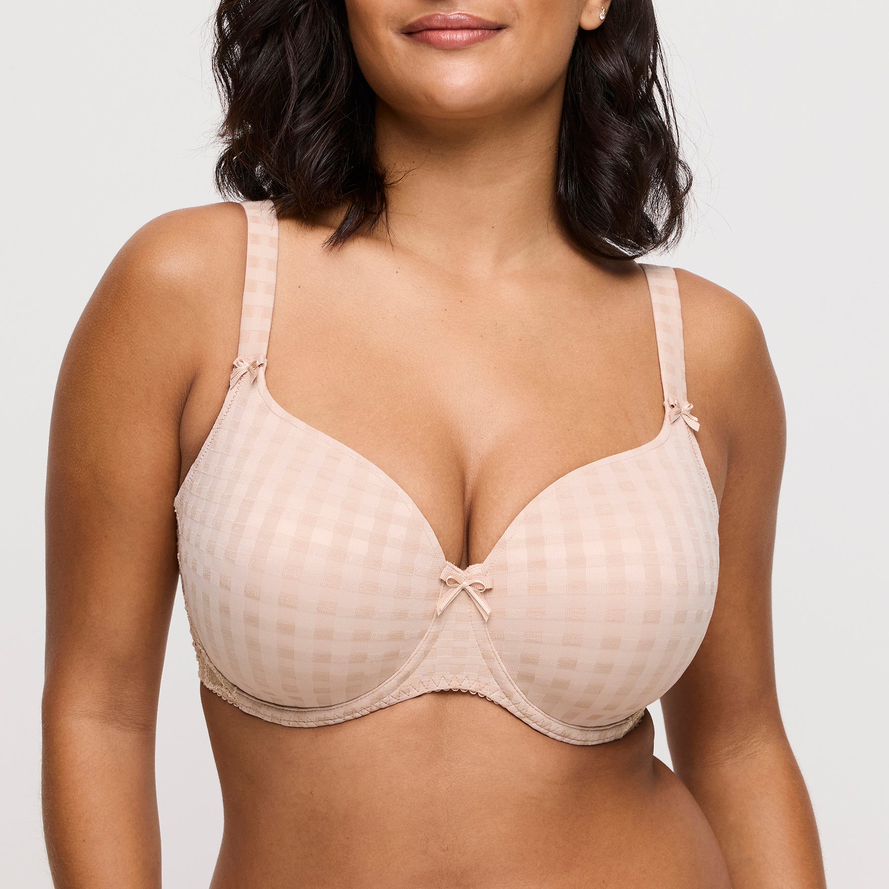 PrimaDonna Madison caffe latte bra on model showing rounded cup shape, supportive underwire, and soft checked fabric.