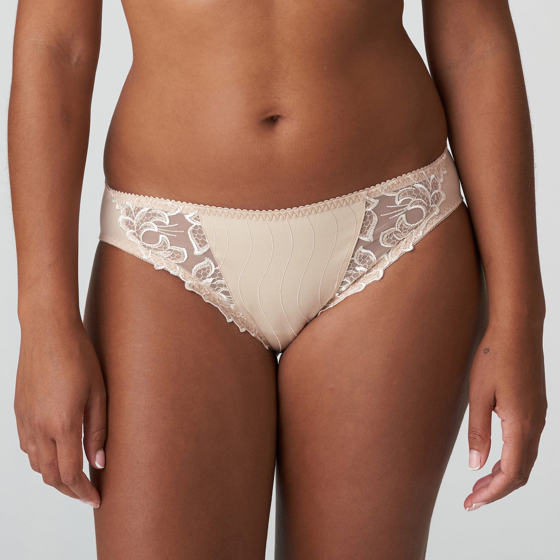 deauville nude rio bikini brief with lace detail front view on model