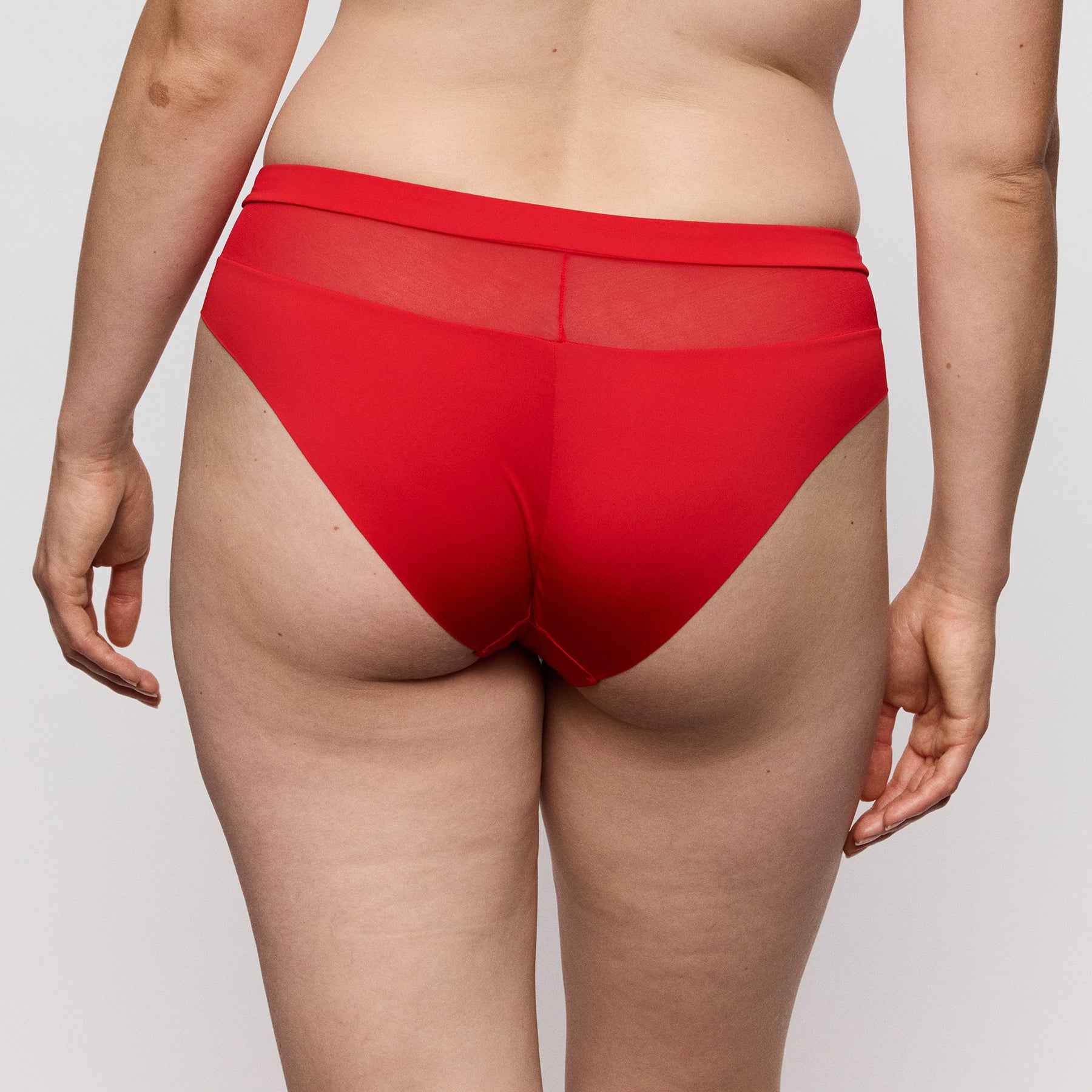 PrimaDonna Sophora Rio bikini style 056-3180 in true red featuring embroidered lace front and flattering mid-rise cut.