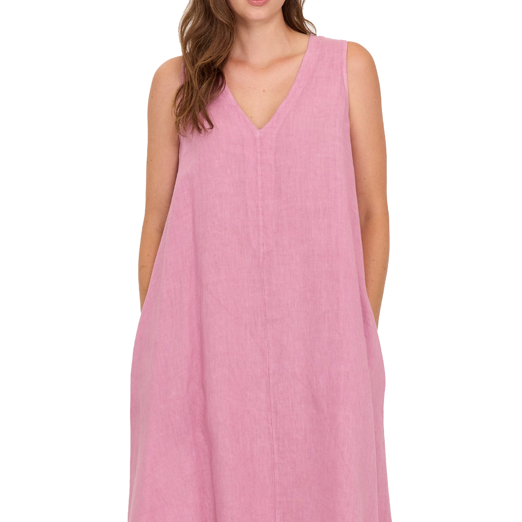 Close-up of peony pink linen dress with V-neckline and soft flowing fabric