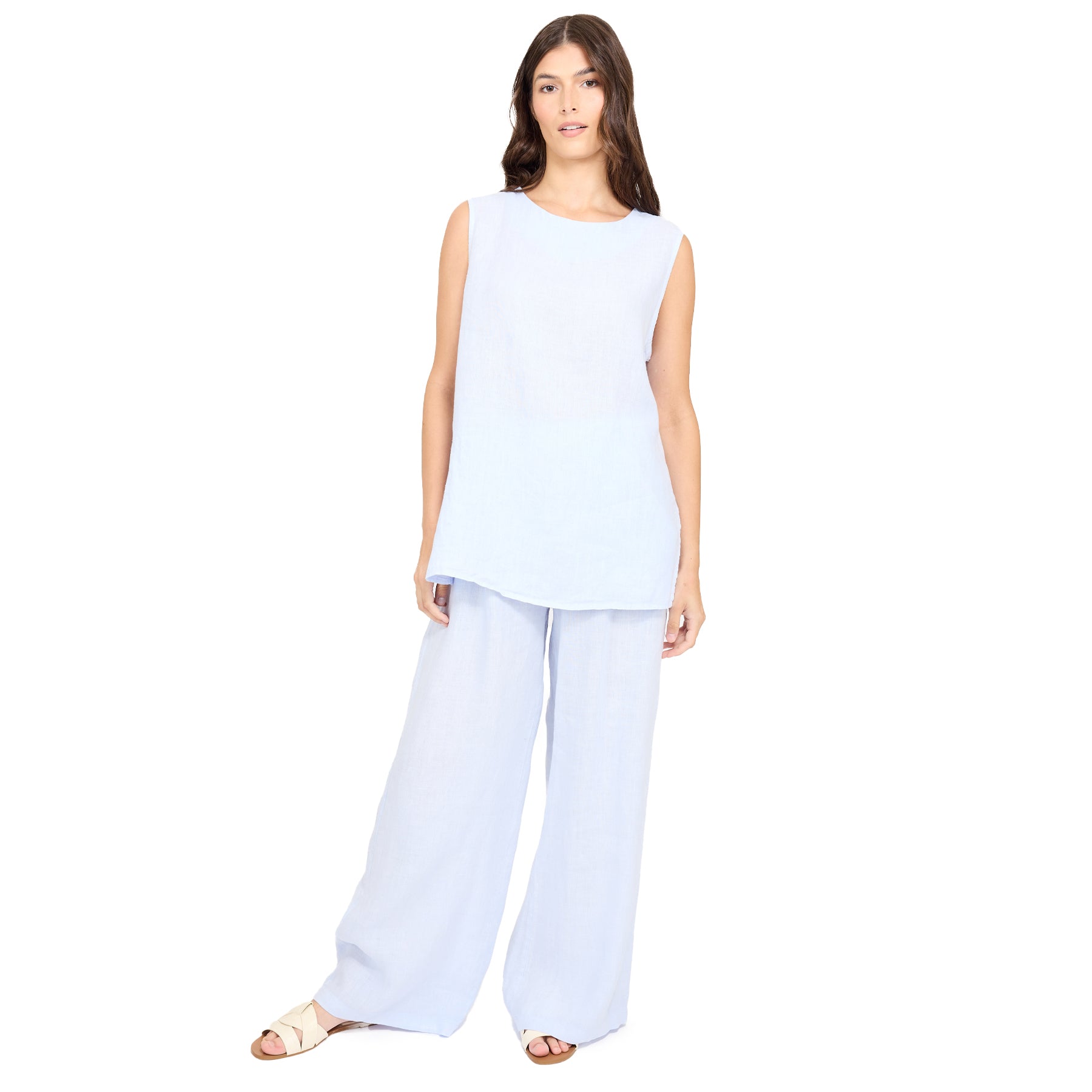 Light blue sleeveless top and matching wide-leg pants on a model, featuring a relaxed, flowing silhouette in soft, airy fabric for an effortless coordinated look.
