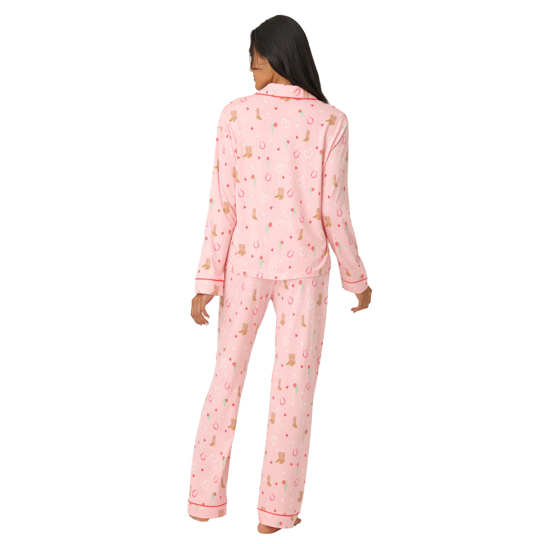 Back view of the pink long sleeve pyjama top and matching pants featuring the all-over heart and western-inspired print.
