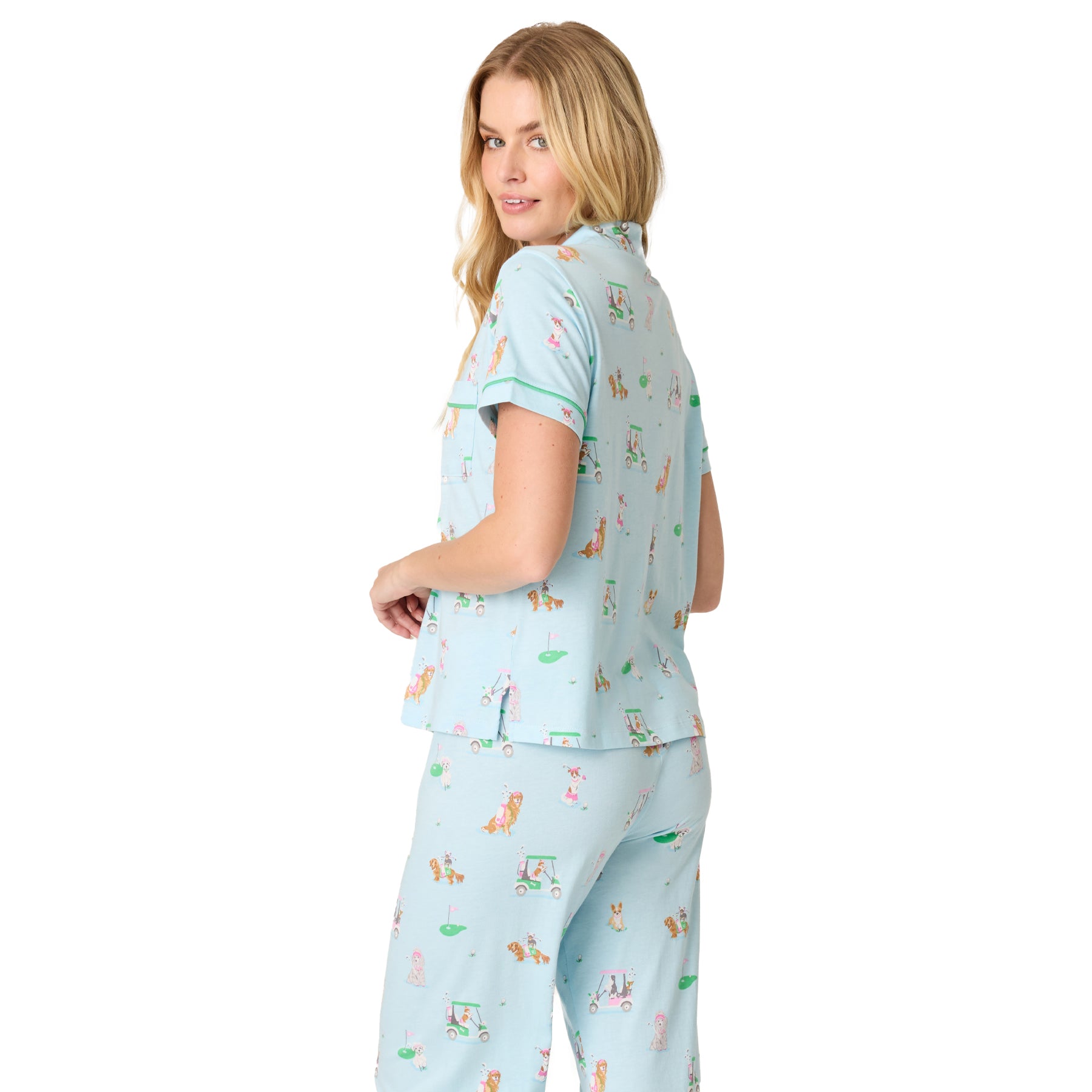 Light blue short sleeve women’s pyjama set with playful dog and golf cart print, back view