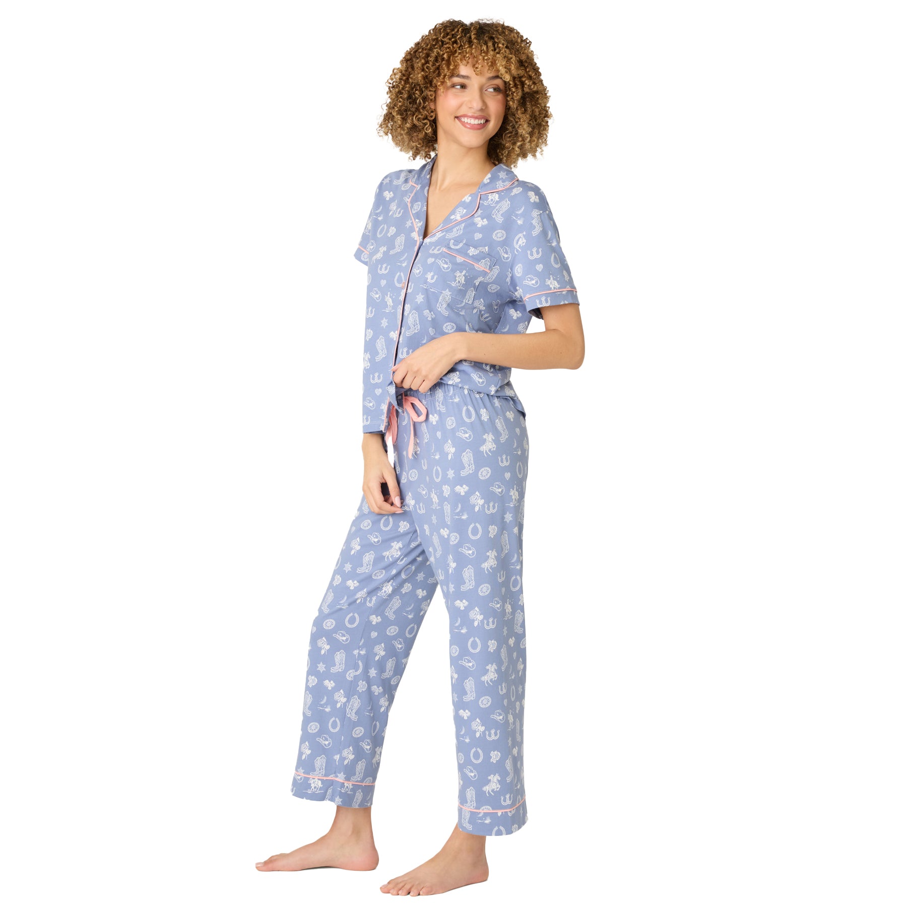 Women’s light blue western print pyjama set with relaxed fit pants and short sleeve top, side view