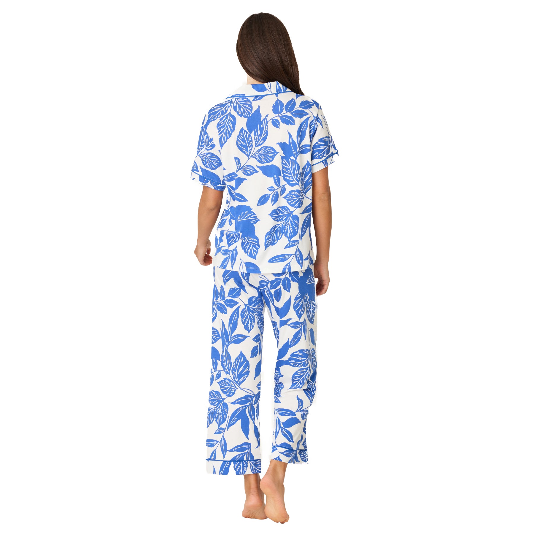 Back view of women’s white and cobalt blue floral pyjama set with relaxed fit