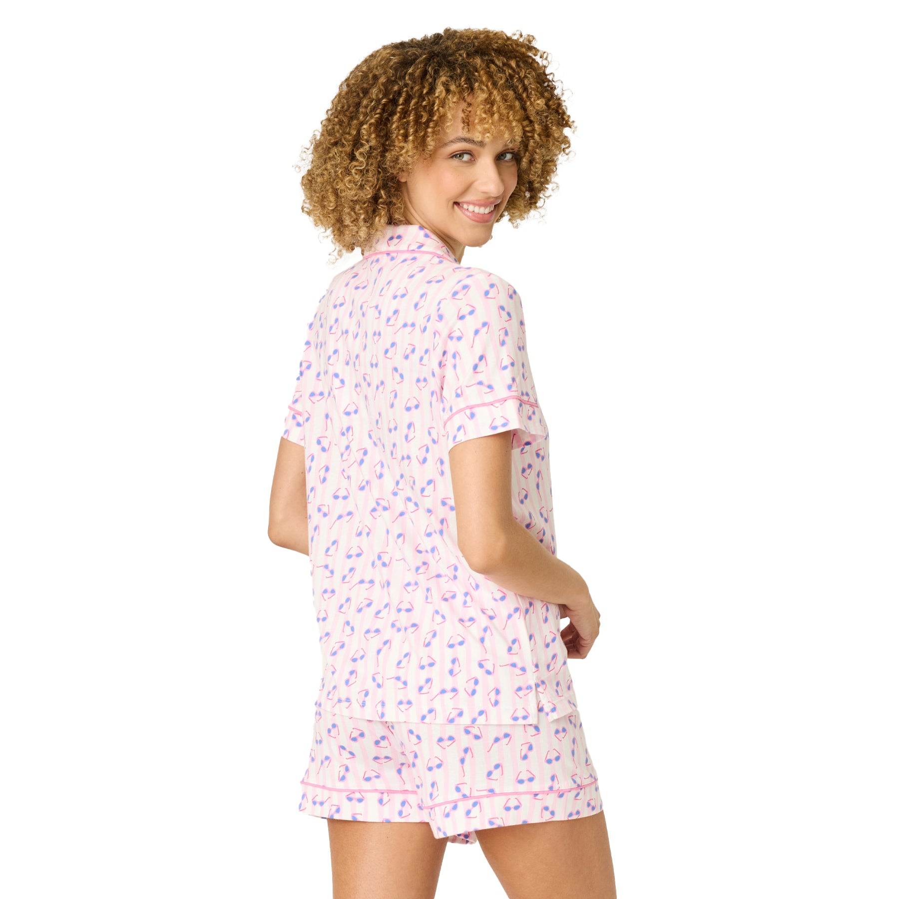 Women’s light pink short sleeve pyjama set with stripe and sunglasses print, back view