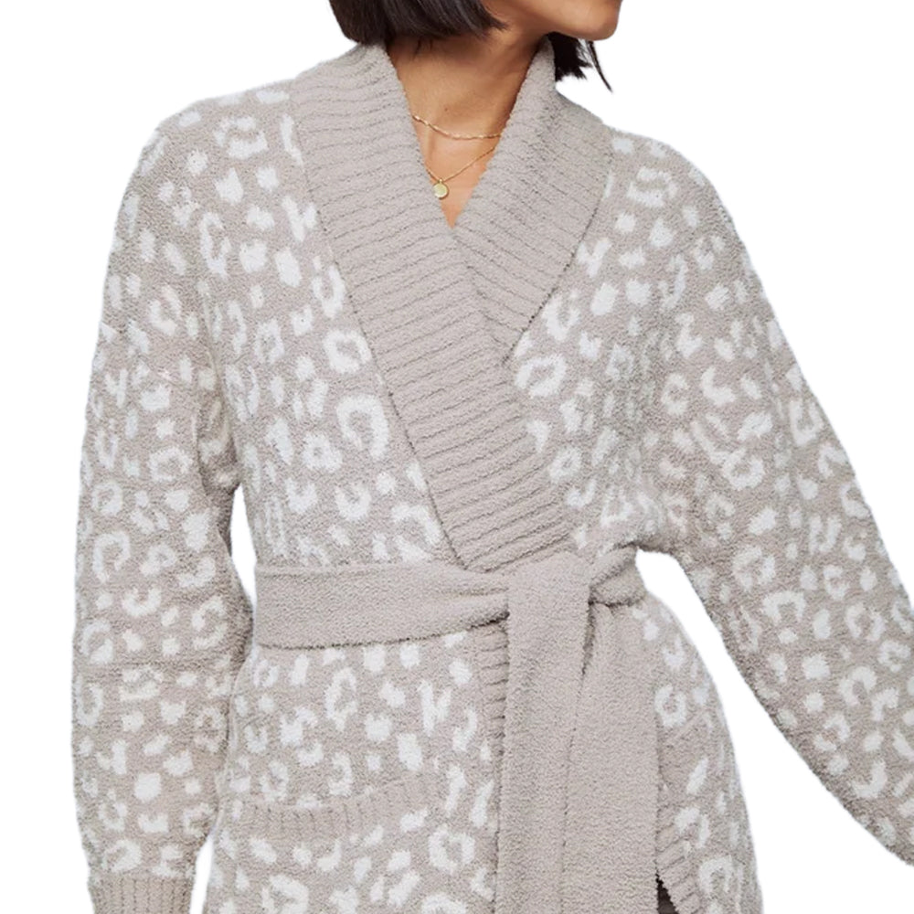 Close-up of a beige leopard-print knit robe showcasing the plush fabric, wide ribbed shawl collar, matching waist belt, and textured knit detailing.