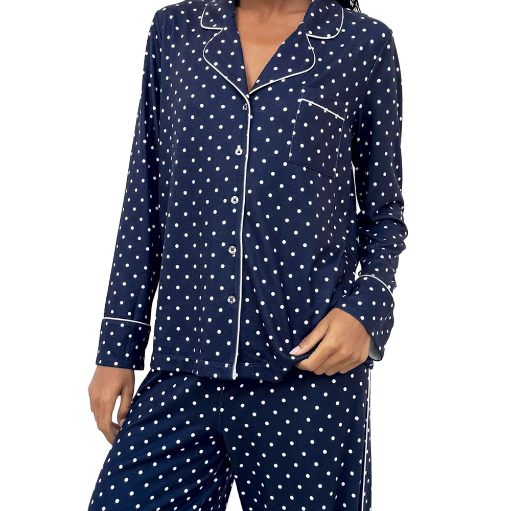 Close-up of Splendid Pillowsoft navy polka dot pajama set, highlighting the button-front shirt, chest pocket, white contrast piping, and matching relaxed-fit pants.