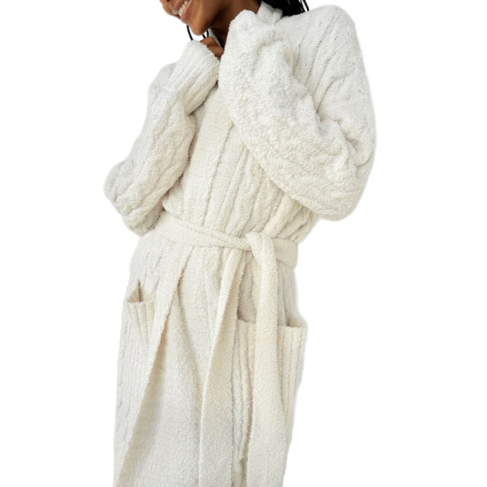 Close-up of Splendid ivory plush robe highlighting its cozy textured fabric, ribbed cuffs, shawl collar, front patch pockets, and adjustable waist belt.