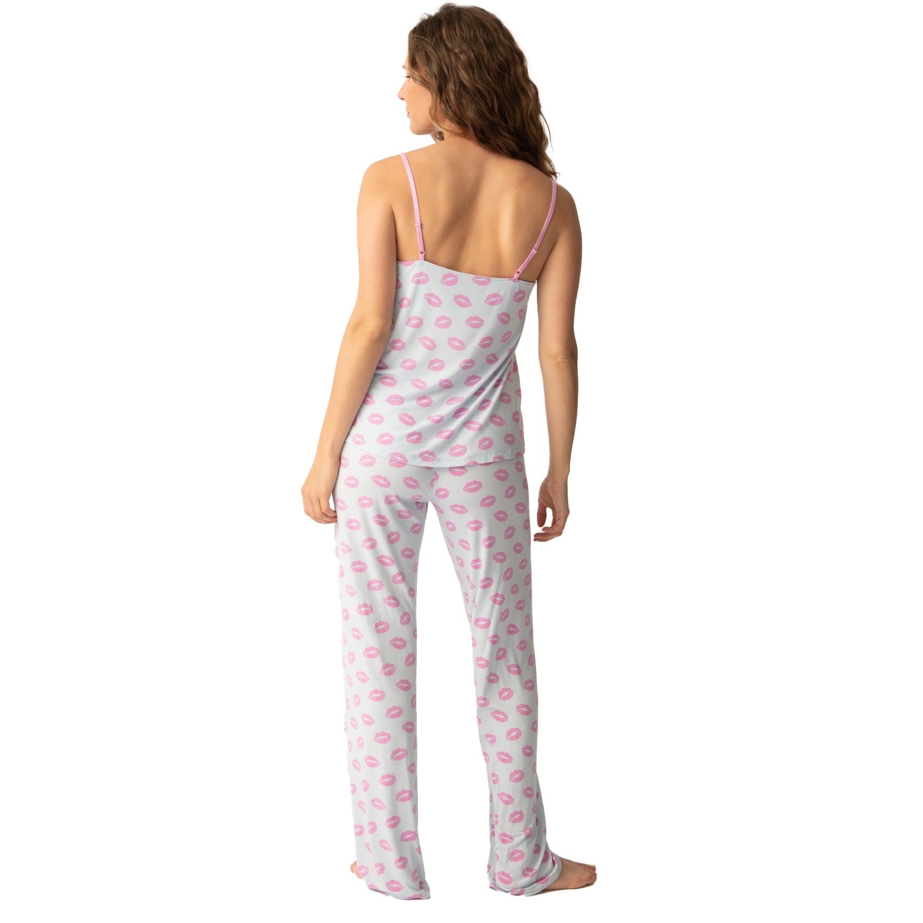 Playful pink lip-print pajama set with a camisole top and relaxed-fit pants, featuring a pink drawstring tie for a cozy and feminine look, back view.