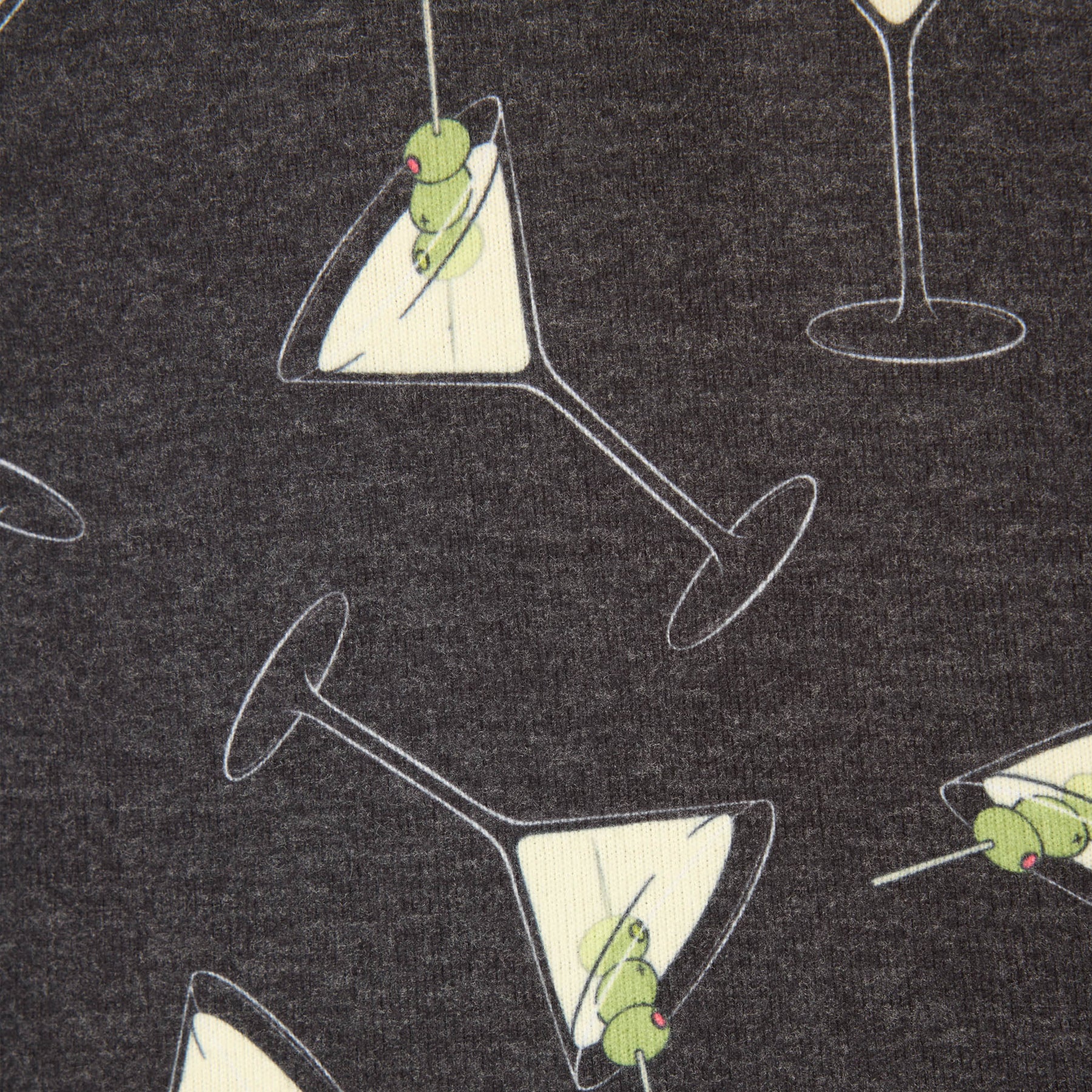 Pattern of martini glasses with olives on a dark background