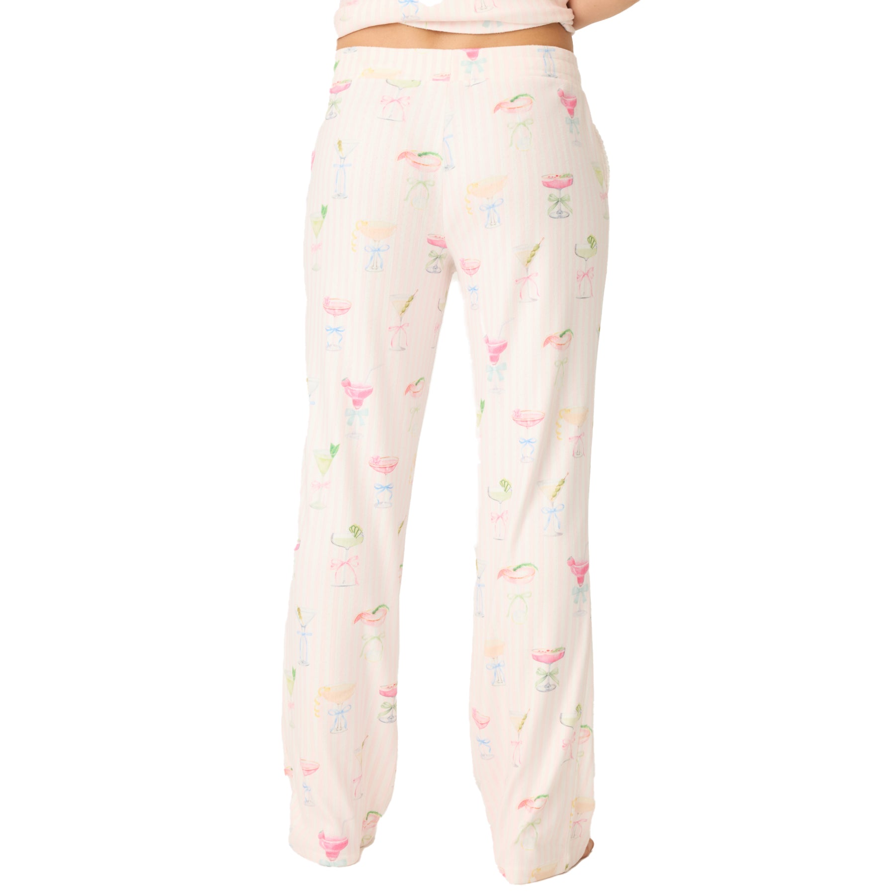 Back view of women’s pyjama pants in pink with all-over cocktail print.