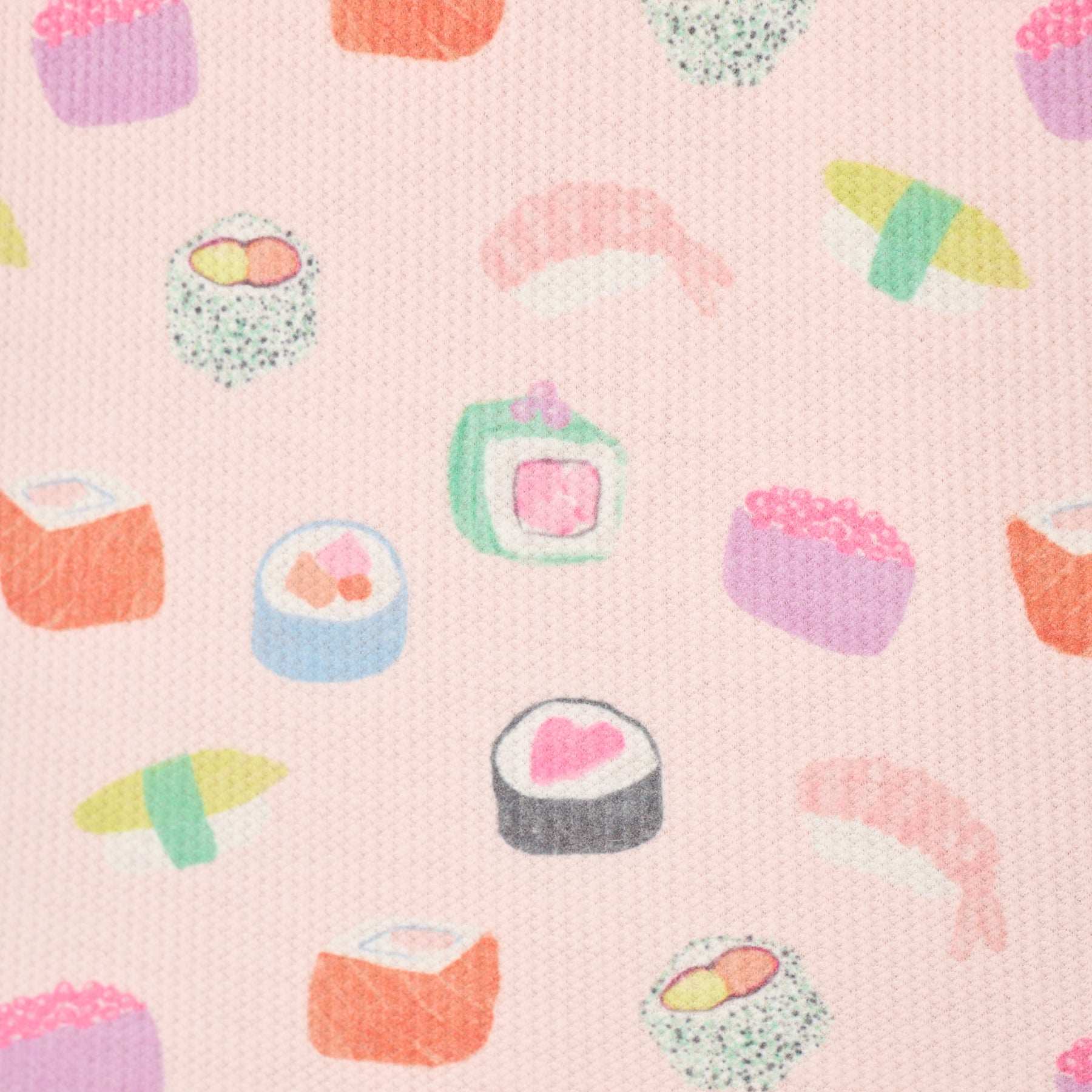 Close-up of soft pink waffle knit fabric with playful sushi print featuring sushi rolls, nigiri, maki, and colorful Japanese-inspired motifs.