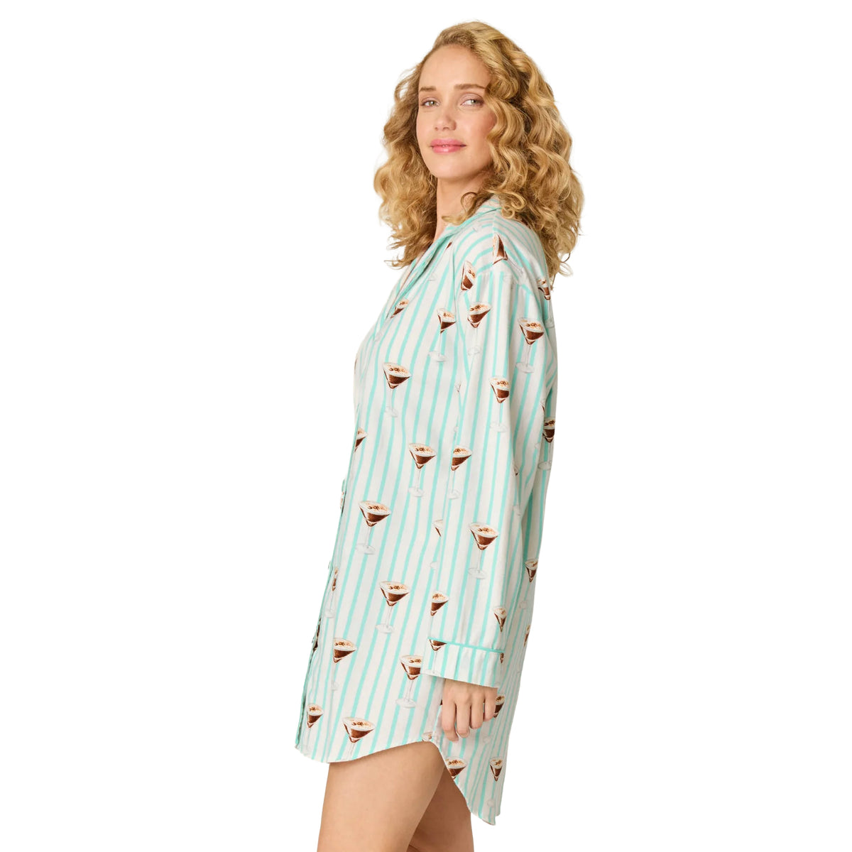 Model wearing PJ Salvage Tipsy Time pool blue sleepshirt with long sleeves and curved hem, side view.