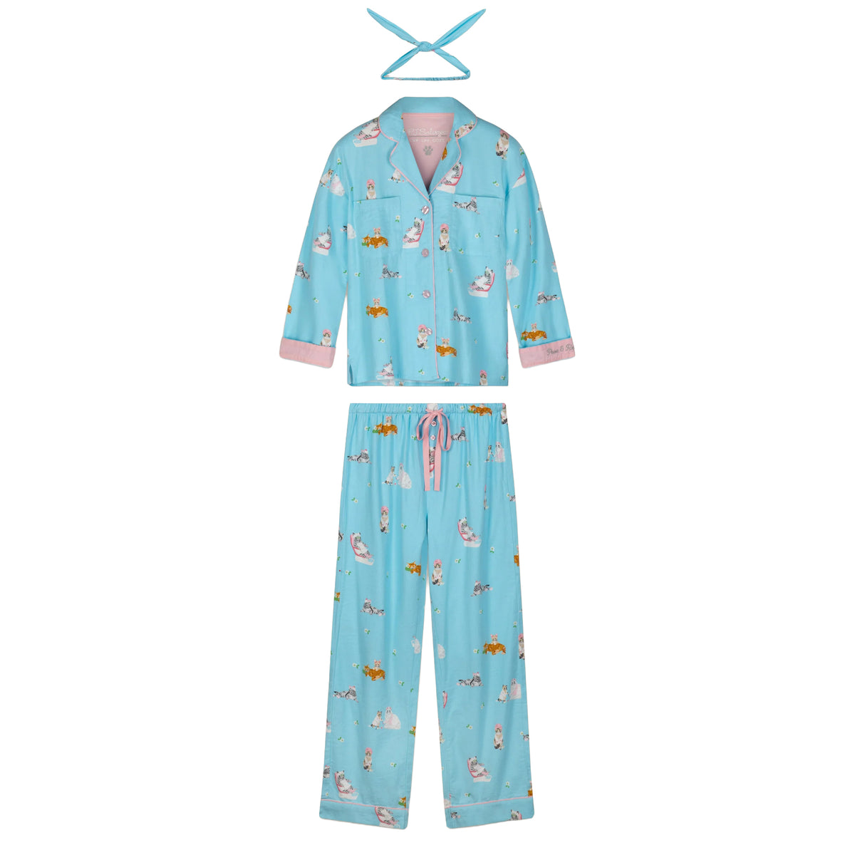 PJ Salvage Paws & Relax flannel pyjama set in blue featuring long sleeve button-down top, matching pants and coordinating headband, flat lay.