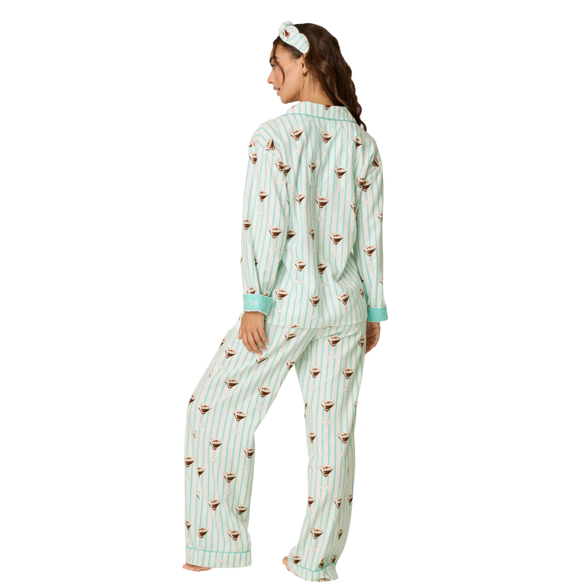 Model wearing PJ Salvage Tipsy Time striped pyjama set with cocktail print, back view.