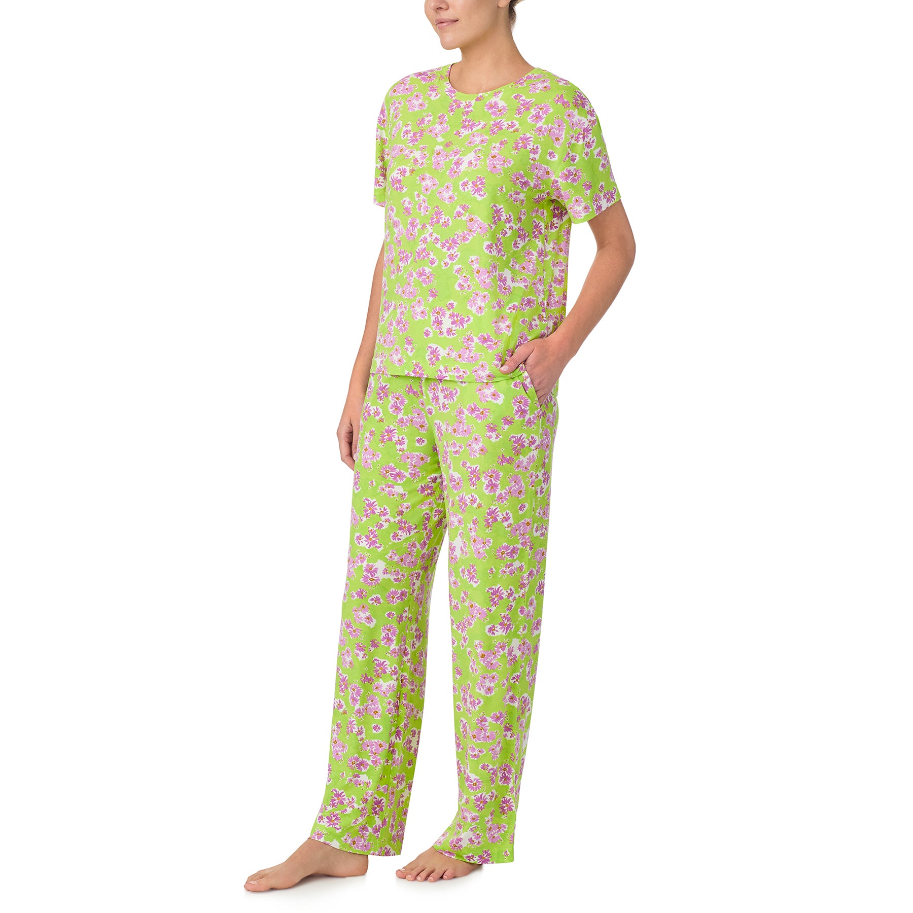 sanctuary short sleeve top and pants set in purple flower print on a lime green background. Side view on model.