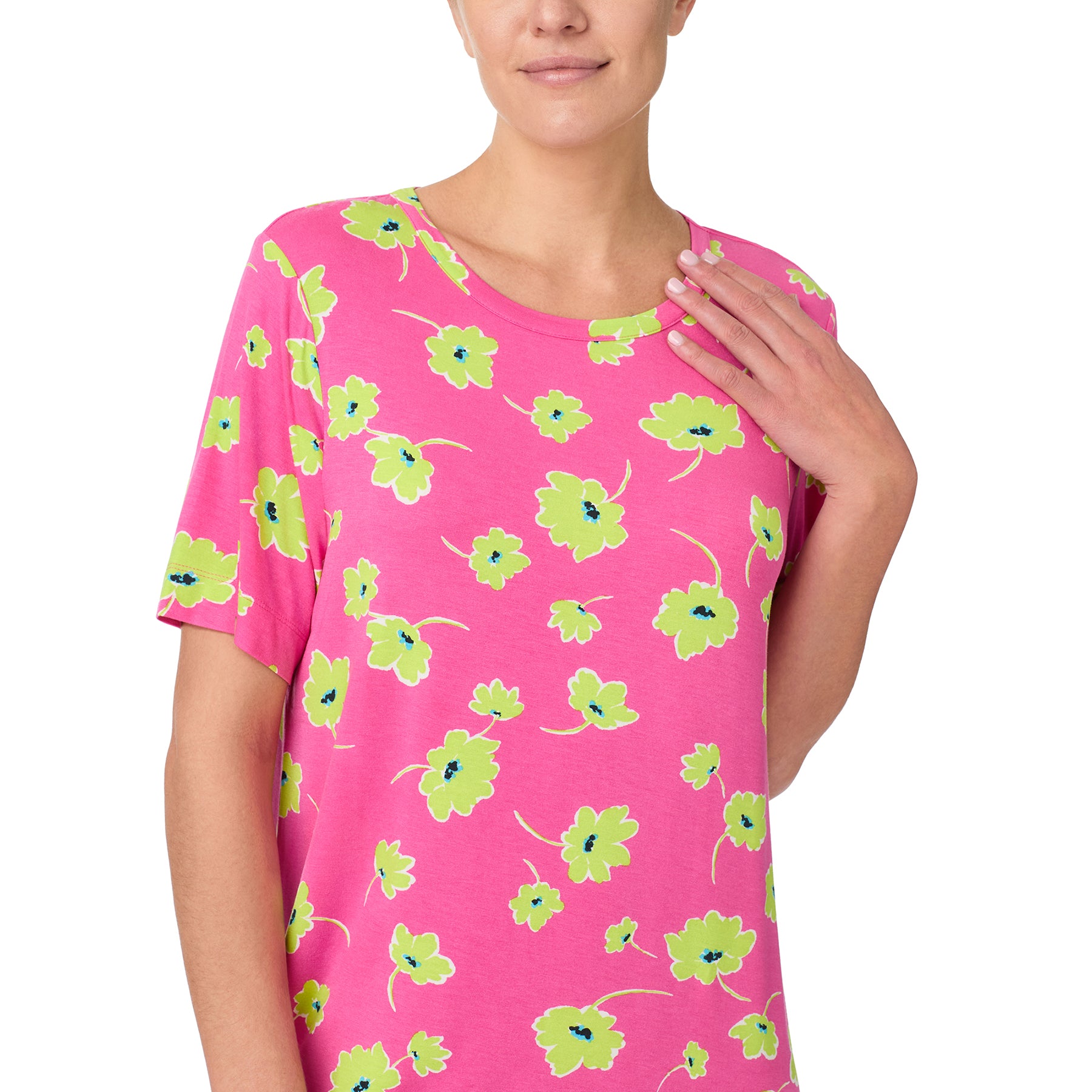 sanctuary short sleeve chemise in lime green poppy flower print on a hot pink background. Front view close up on model.