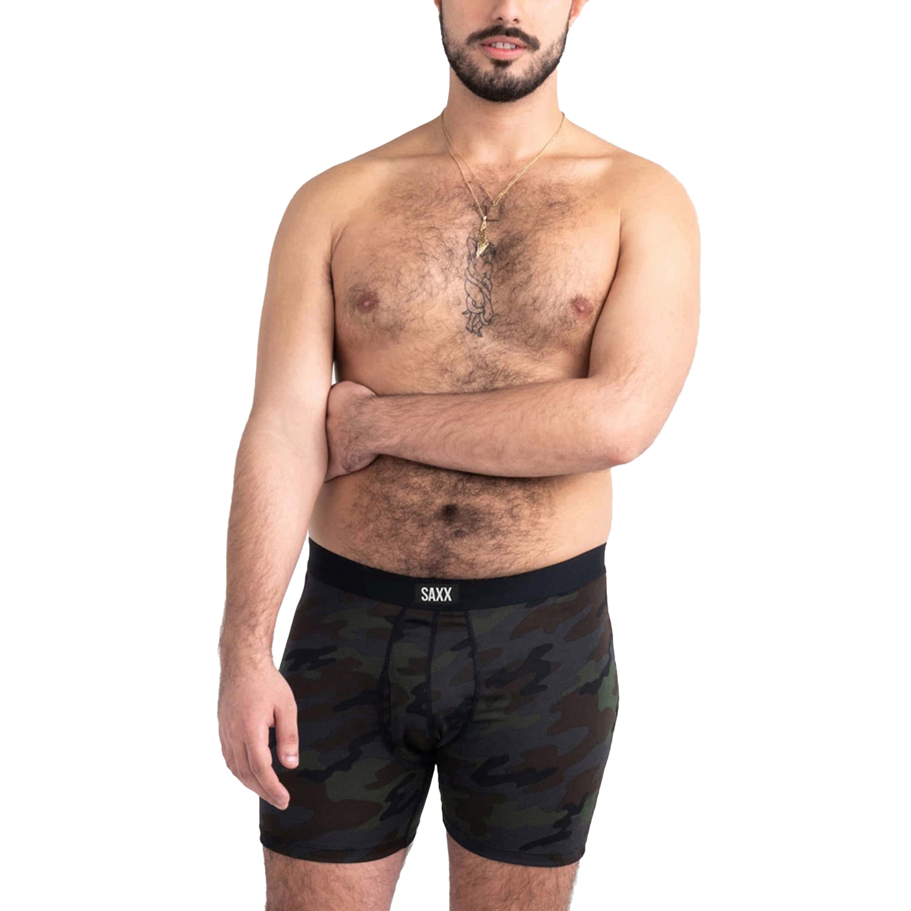 Model wearing SAXX Daytripper comfort stretch boxer brief in black ops camo, front view with supportive pouch and branded waistband