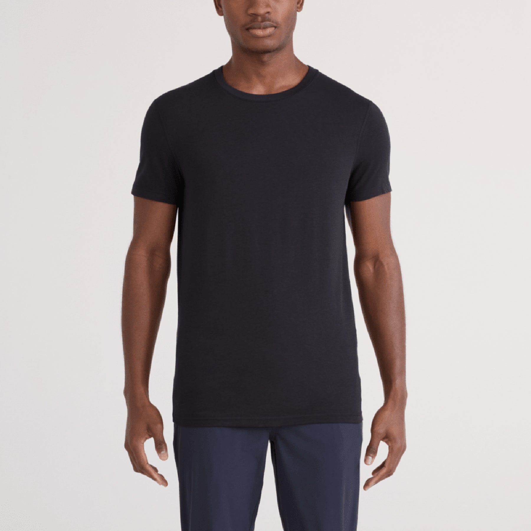 SAXX SXTS82 Short Sleeve Drop Temp Cooling TShirt in BLACK. Front view on model.