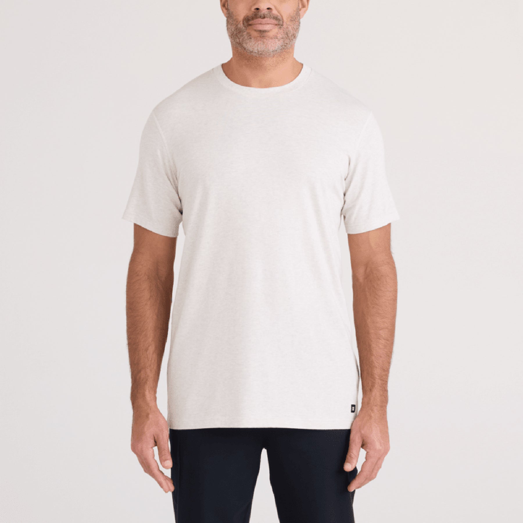 SAXX SXTS82 Short Sleeve Drop Temp Cooling TShirt in STEEL HEATHER. Front view on model.