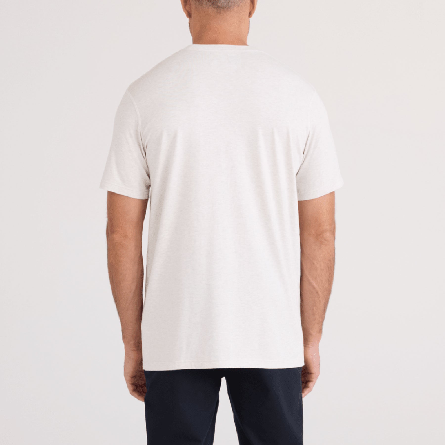 SAXX SXTS82 Short Sleeve Drop Temp Cooling TShirt in STEEL HEATHER. Rear view on model.