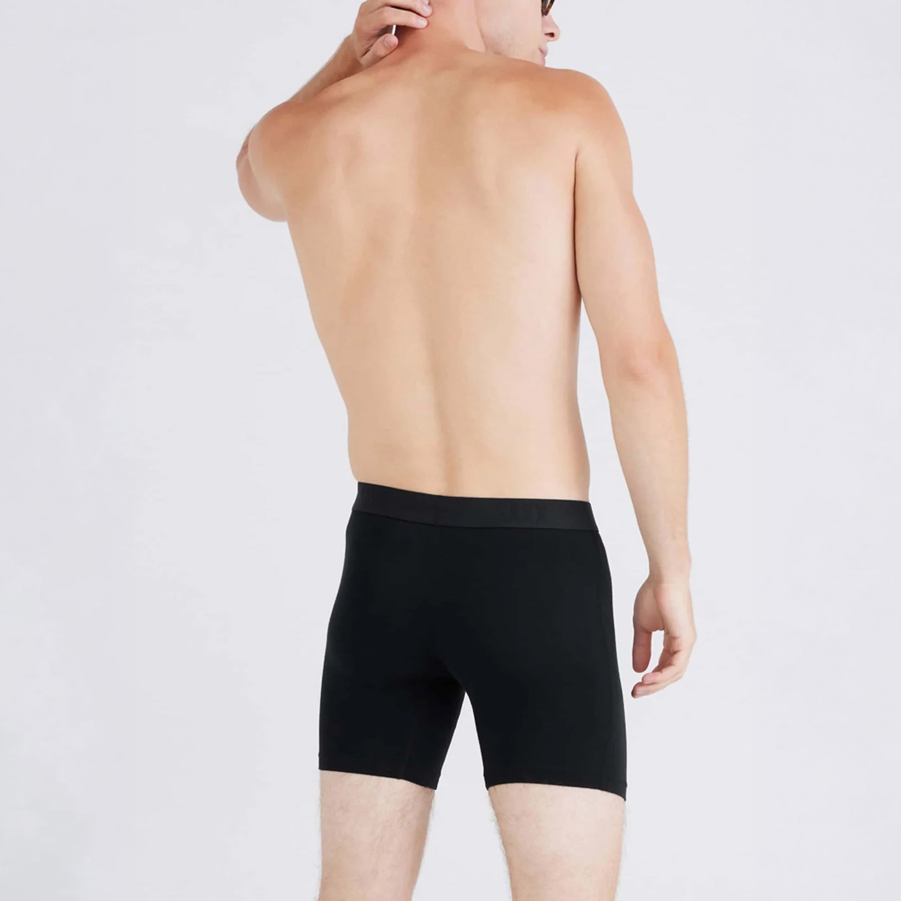 SAXX Vibe Xtra Soft Comfort Trunk #SXVX24F in black. Rear view on model.