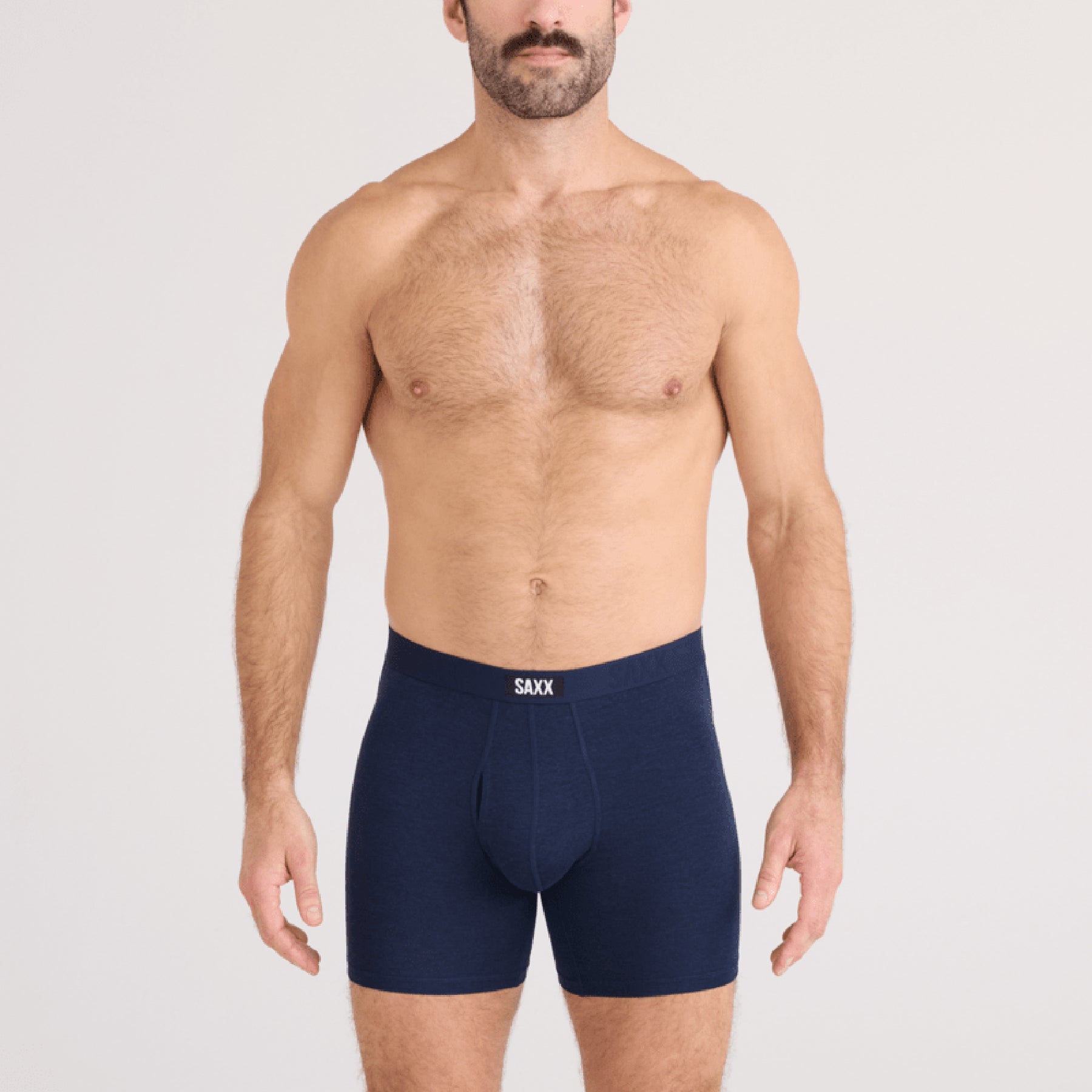 SAXX Vibe Xtra Soft Comfort Trunk #SXVX24F in dark navy heather DNH. Front view on model.