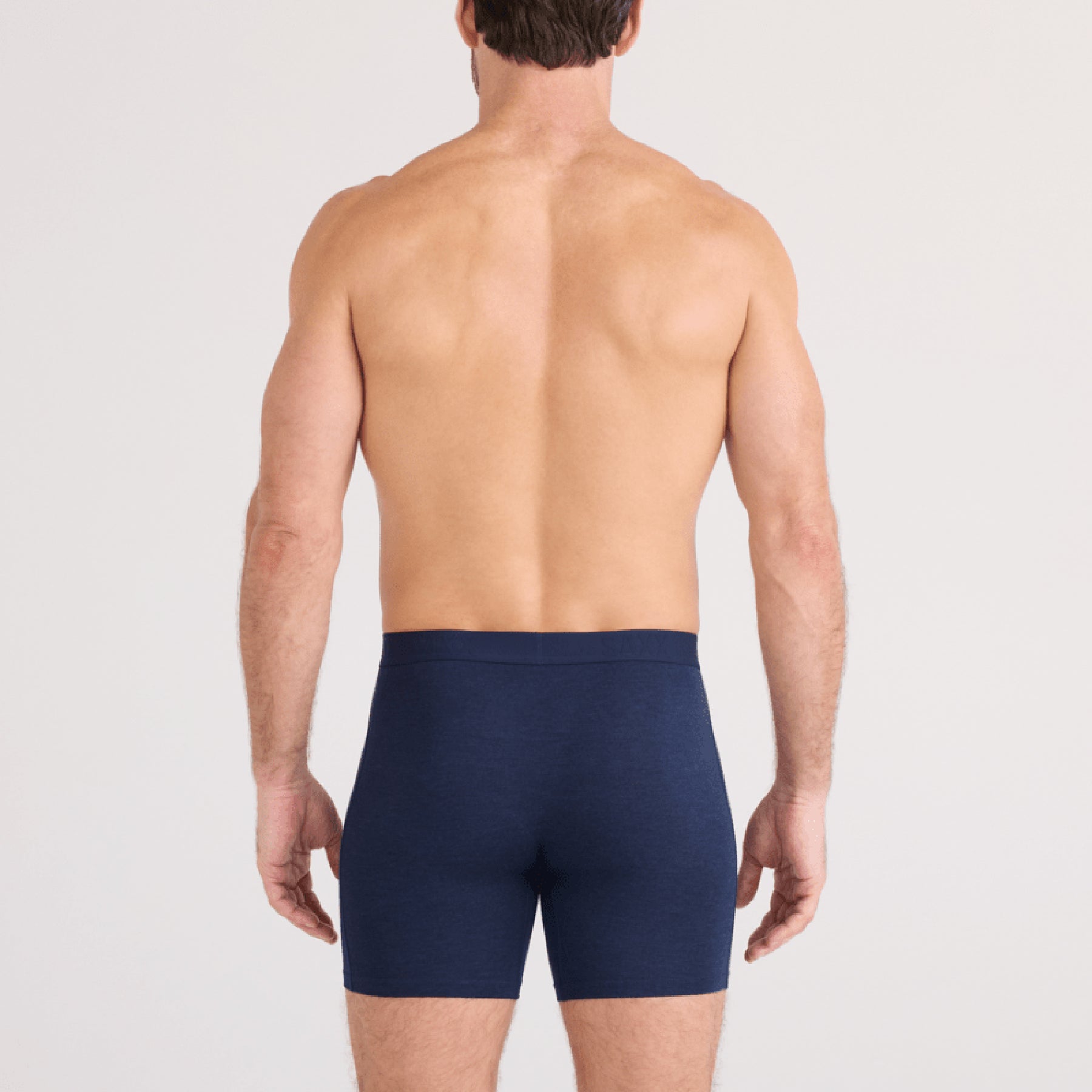 SAXX Vibe Xtra Soft Comfort Trunk #SXVX24F in dark navy heather DNH. Rear view on model.