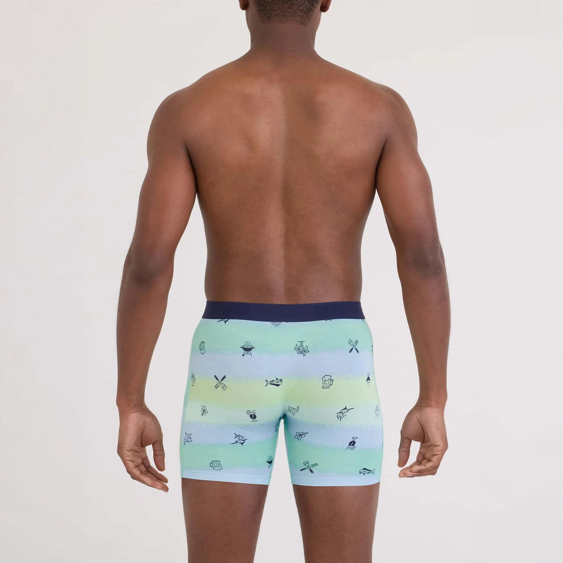 SAXX Vibe Xtra Soft Comfort Trunk #SXVX24F in iconic summer multi ISM. Rear view on model.
