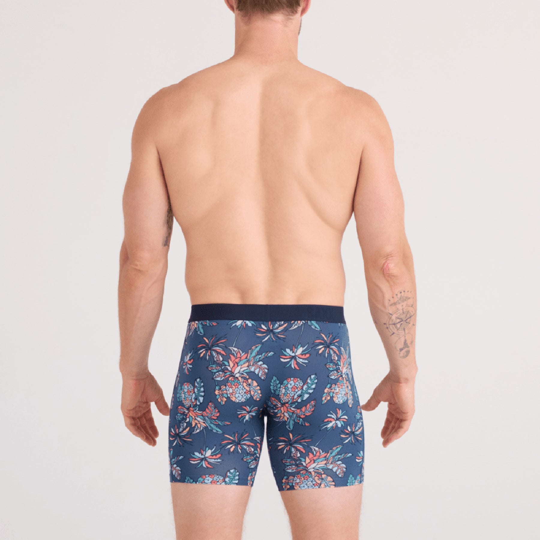 SAXX Vibe Xtra Soft Comfort Trunk #SXVX24F in pineapple tropic indigo PTI. Rear view on model.