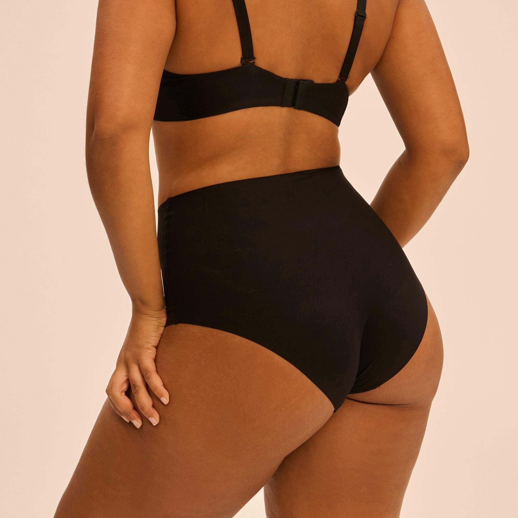 Back view of Simone Perele Story Control Full Brief in Black - full coverage shaping panty with smooth finish