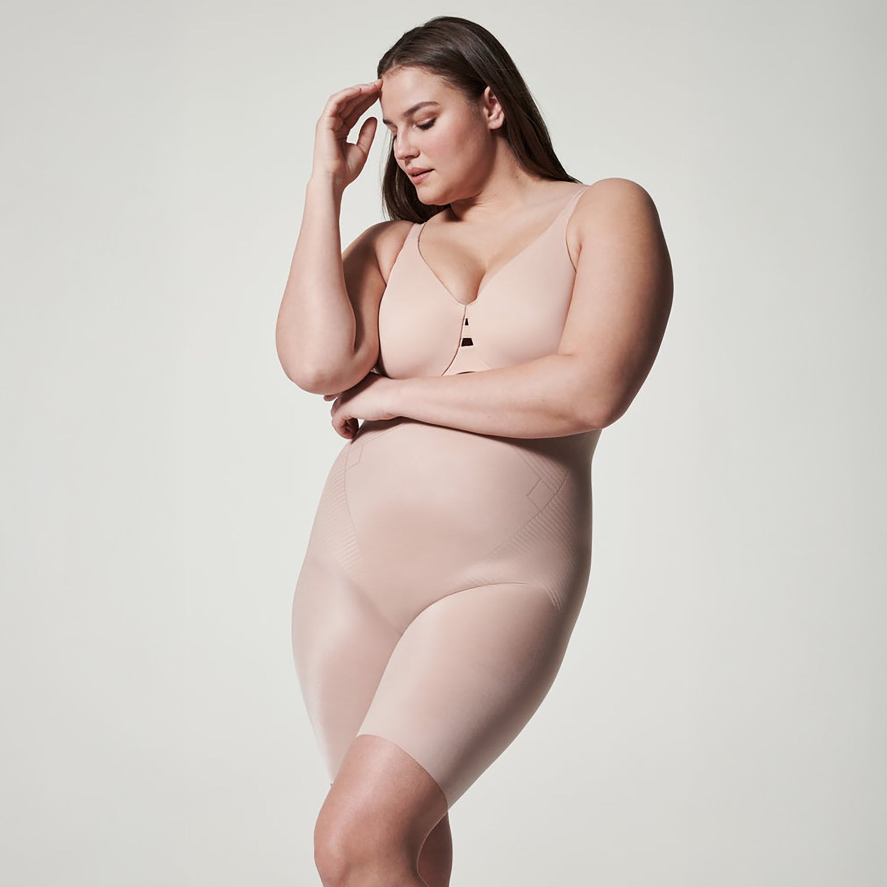 Front view of SPANX High-Waist Control Short Mid-Thigh in Champagne Beige, featuring smooth shaping fabric and seamless finish.