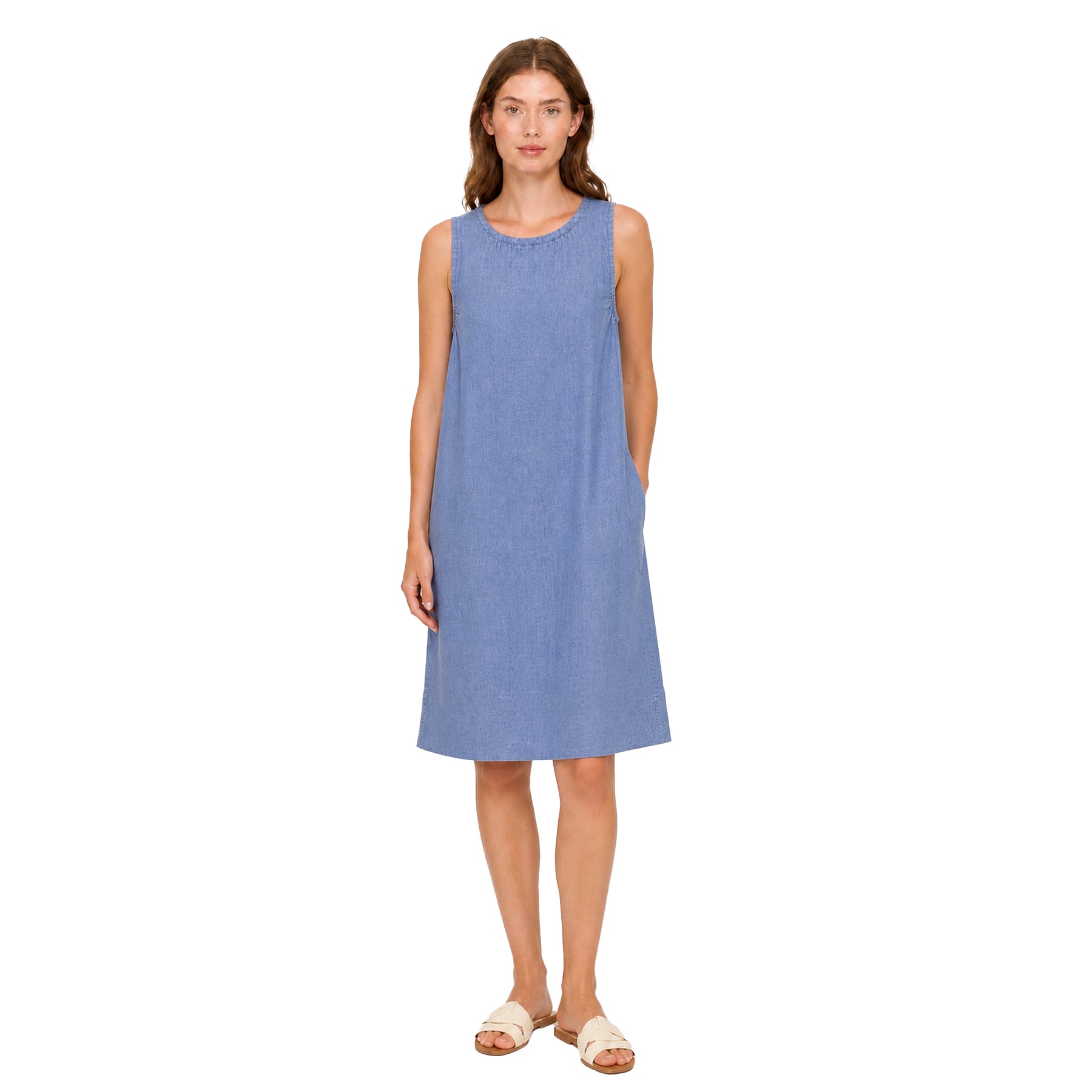 Azure blue sleeveless A-line dress on a model, showcasing a relaxed fit with subtle texture and an easy, knee-length silhouette.