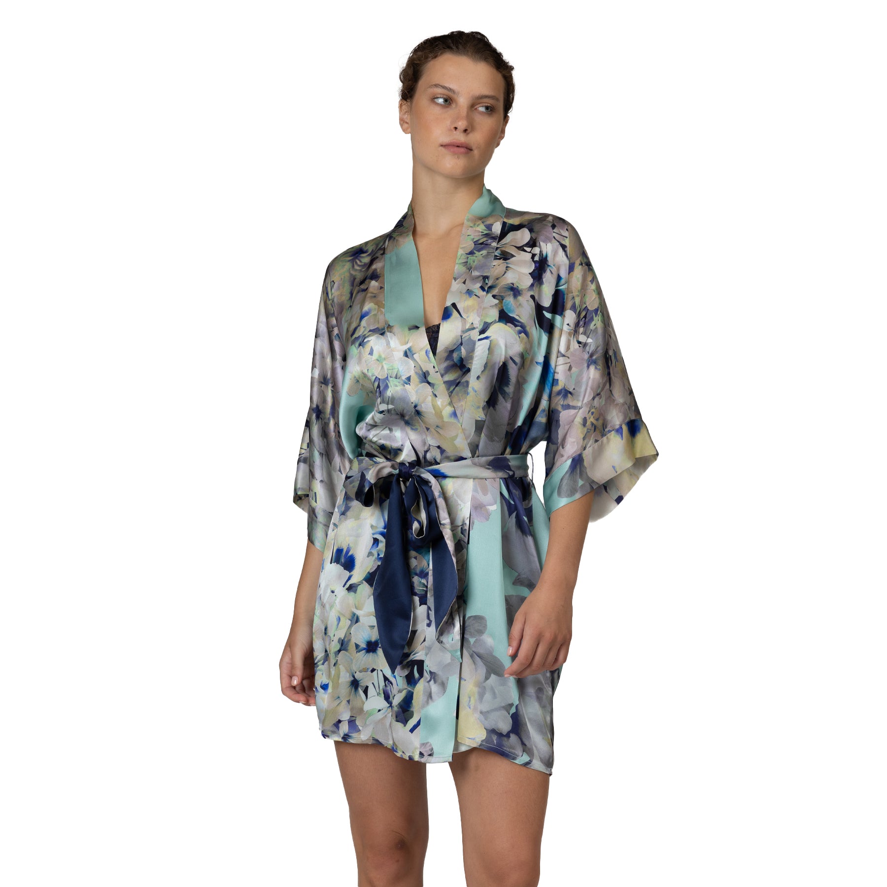 Lightweight floral wrap robe with silky fabric, wide sleeves, and soft aqua satin details for a refined lounge look.
