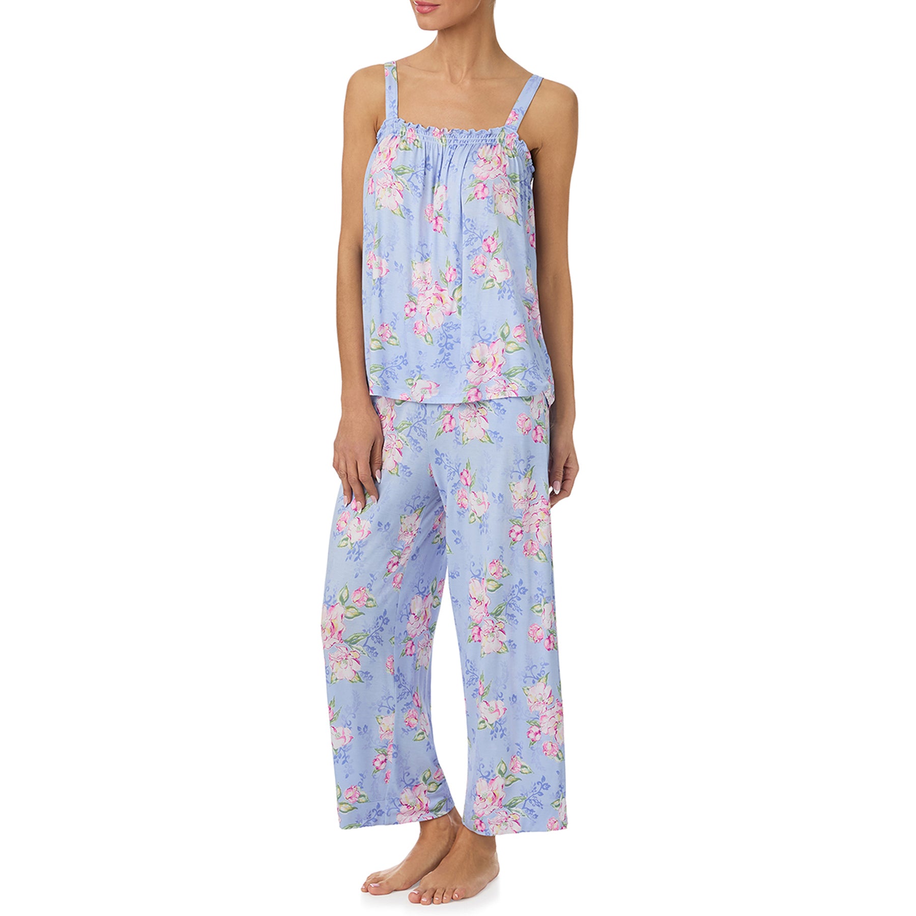 Angled view of blue floral cami pyjama set with soft drape and lightweight feel